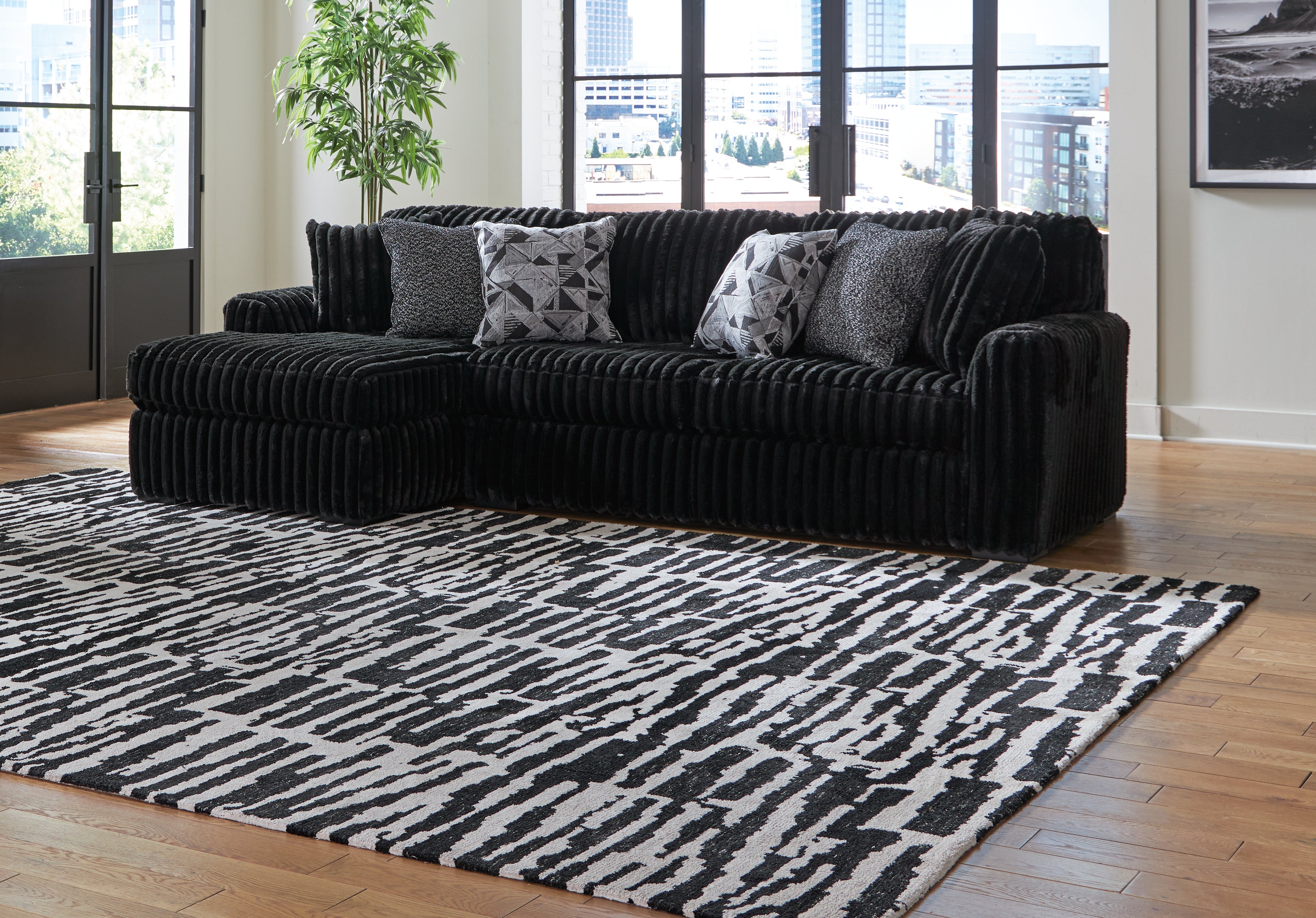 Floridian Furniture - Ashley Furniture - Midnight-Madness Sectional - LAF 3-Piece Sectional with Chaise / Onyx - 98103S9