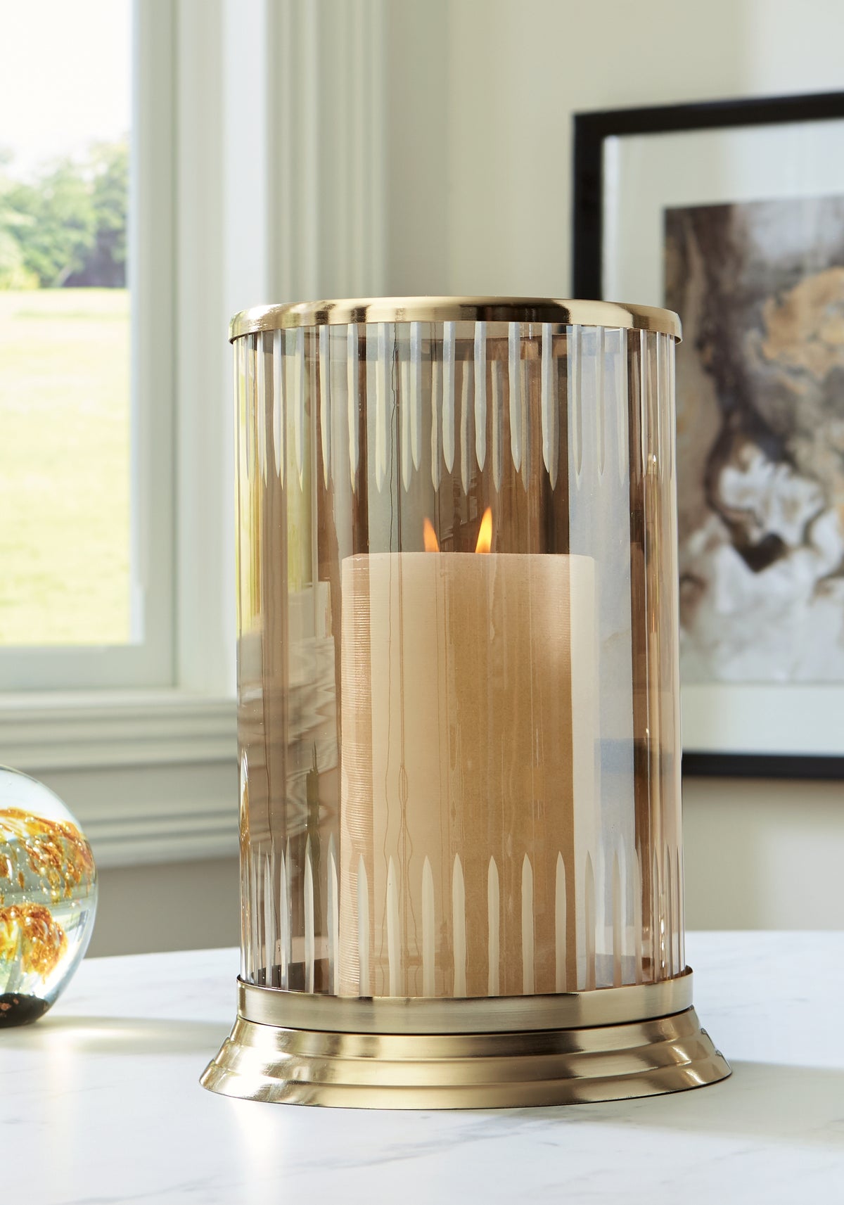Floridian Furniture - Ashley Furniture - Aavinson Candle Holder - Candle Holder / Amber/Gold Finish - A2000688