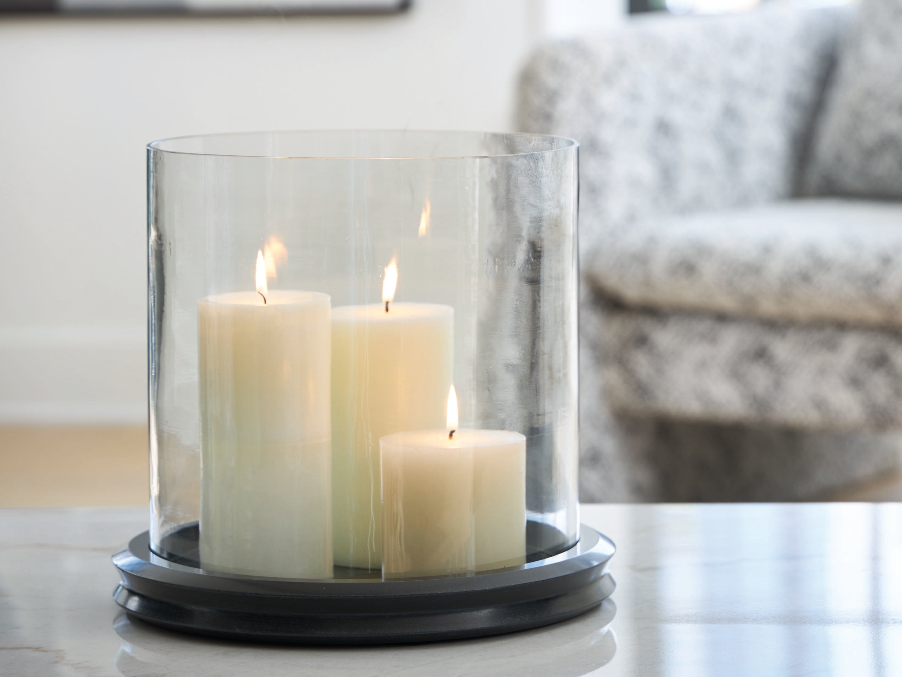 Floridian Furniture - Ashley Furniture - Saskia Candle Holder - Candle Holder / Clear/Black - A2000846