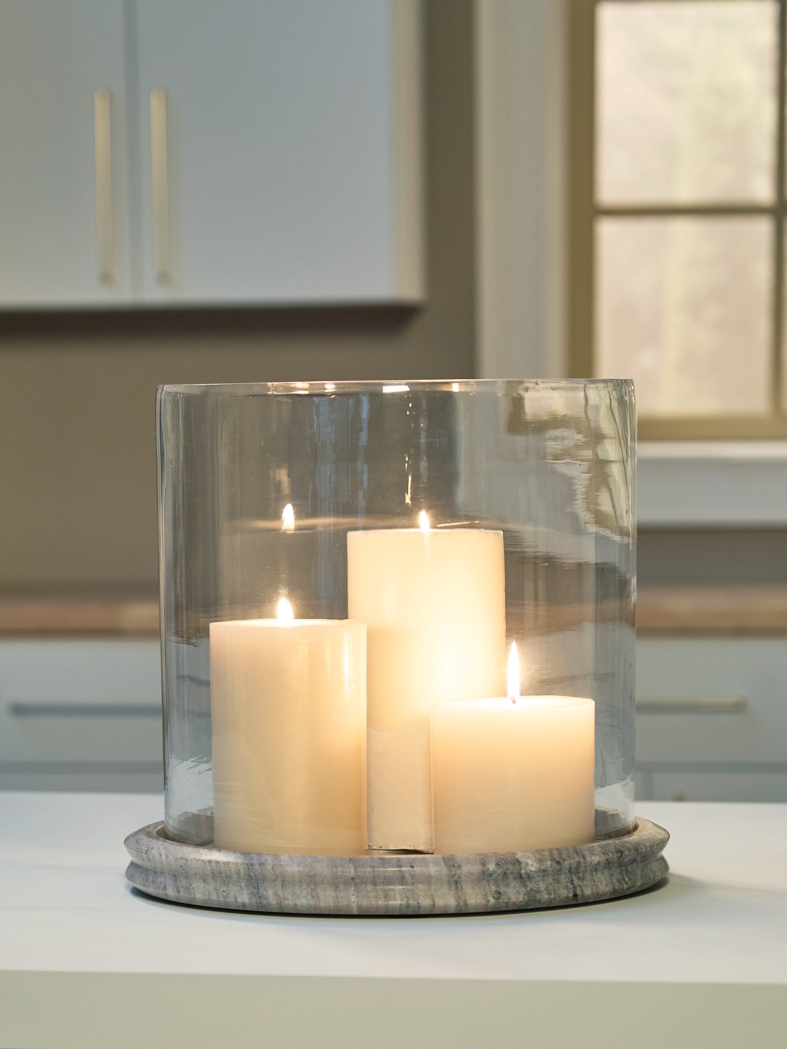 Floridian Furniture - Ashley Furniture - Saskia Candle Holder - Candle Holder / Clear/Black - A2000846