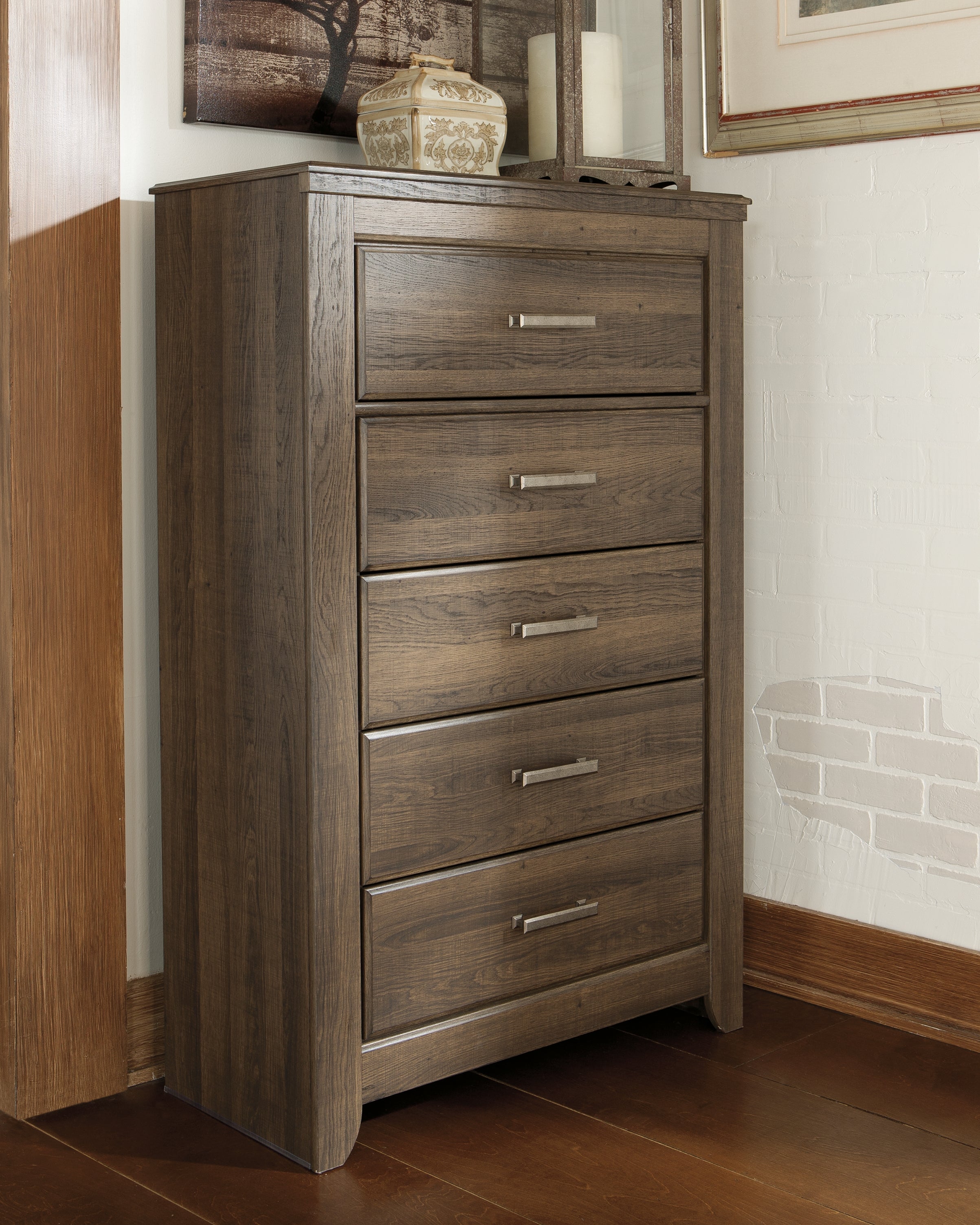 Floridian Furniture - Ashley Furniture - Juararo Bedroom - Five Drawer Chest / Dark Brown - B251-46