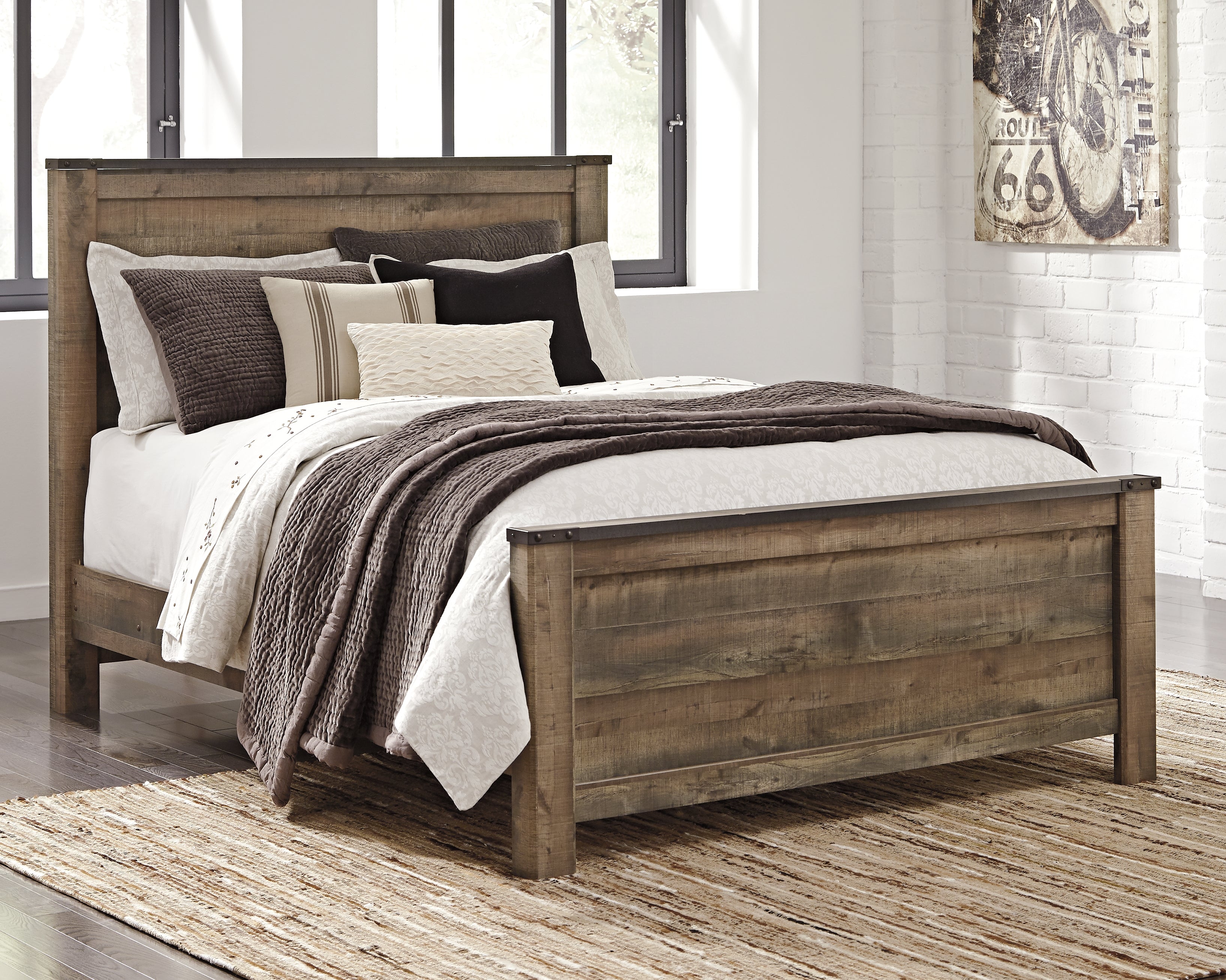 Floridian Furniture - Ashley Furniture - Trinell Bedroom - Queen Panel Bed / Brown - B446B11