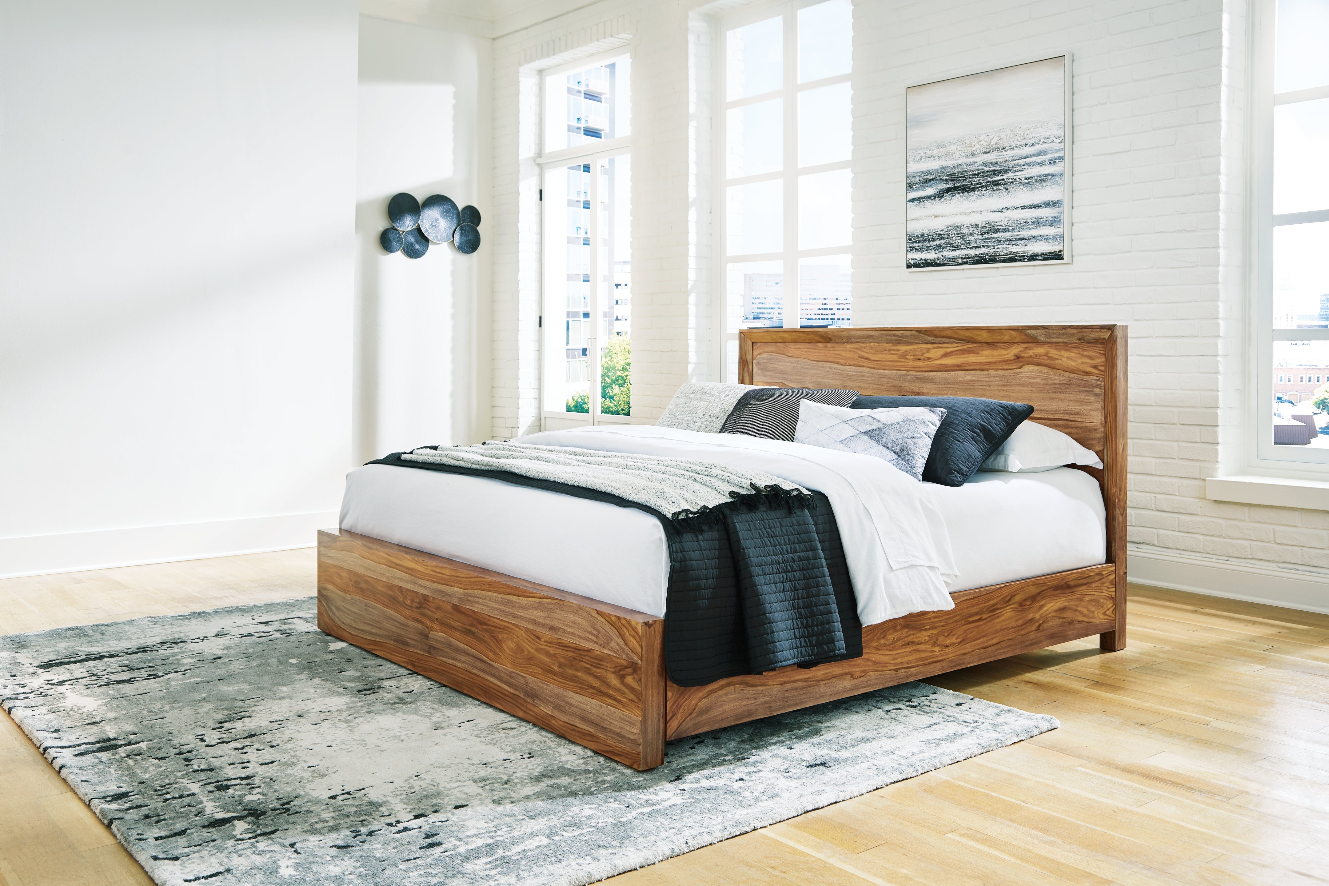 Floridian Furniture - Ashley Furniture - Dressonni Bedroom - California King Panel Bed / Brown - B790B5