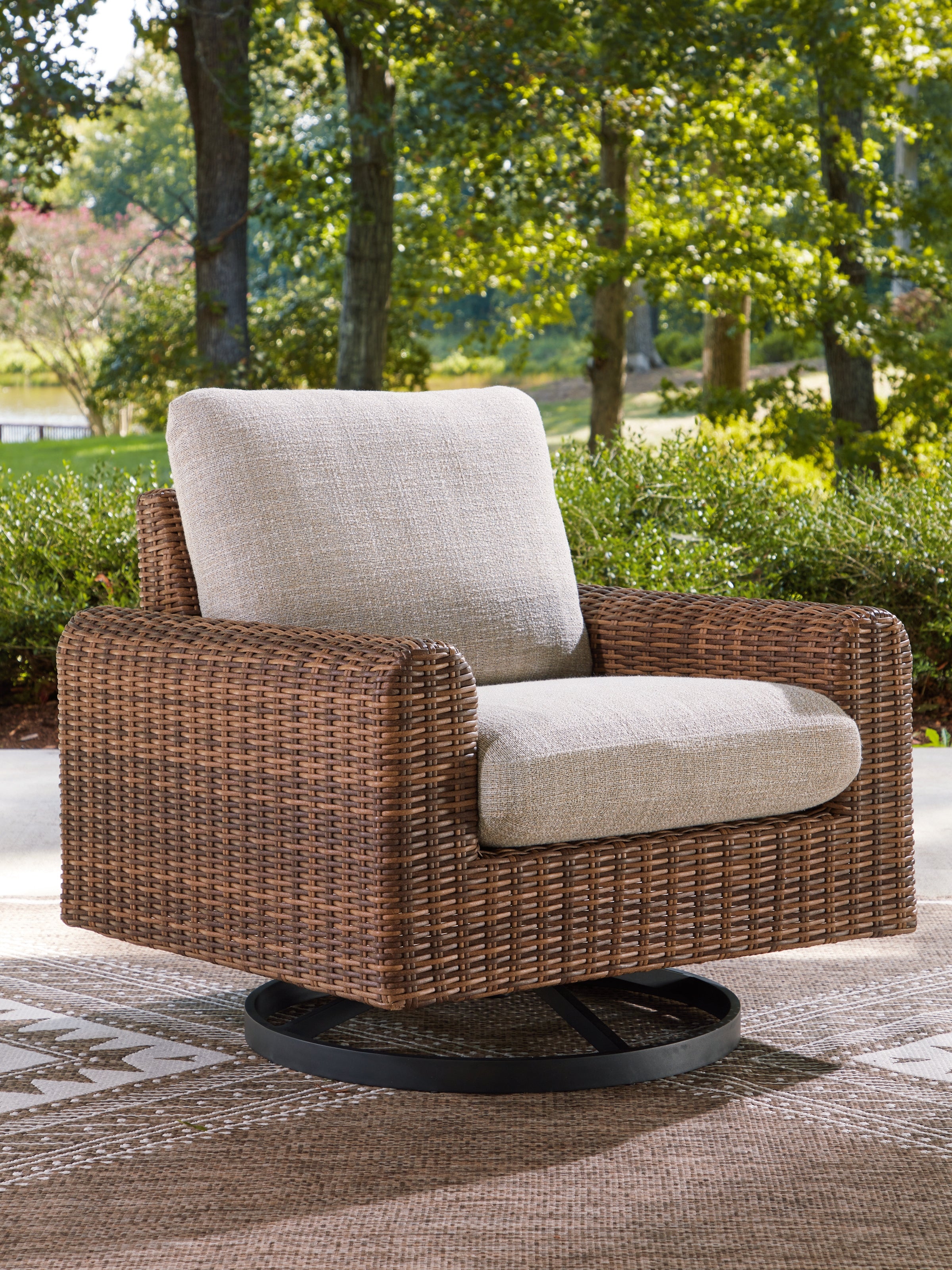 Floridian Furniture - Ashley Furniture - Dolan Creek Outdoor - Swivel Lounge w/ Cushion / Gray/Brown - PCP610-821