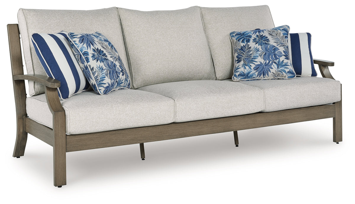 Floridian Furniture - Ashley Furniture - Rainier Ranch Outdoor - Arm Chair With Cushion (Set of 2) / Brown/Beige - P701-601A