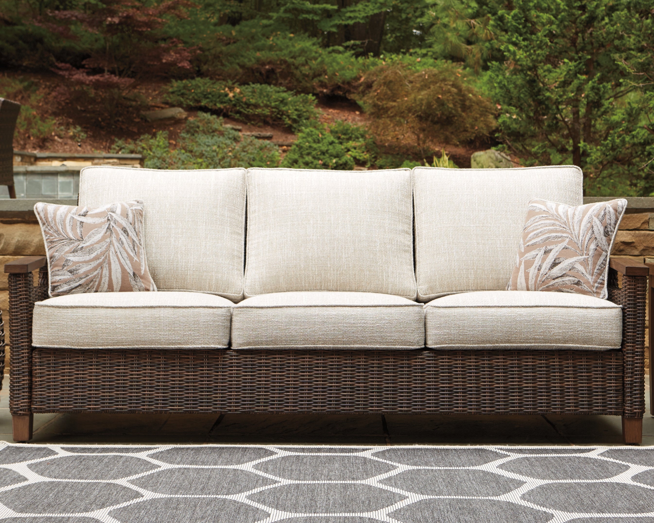 Floridian Furniture - Ashley Furniture - Paradise Trail Outdoor - Sofa with Cushion / Medium Brown - P750-838