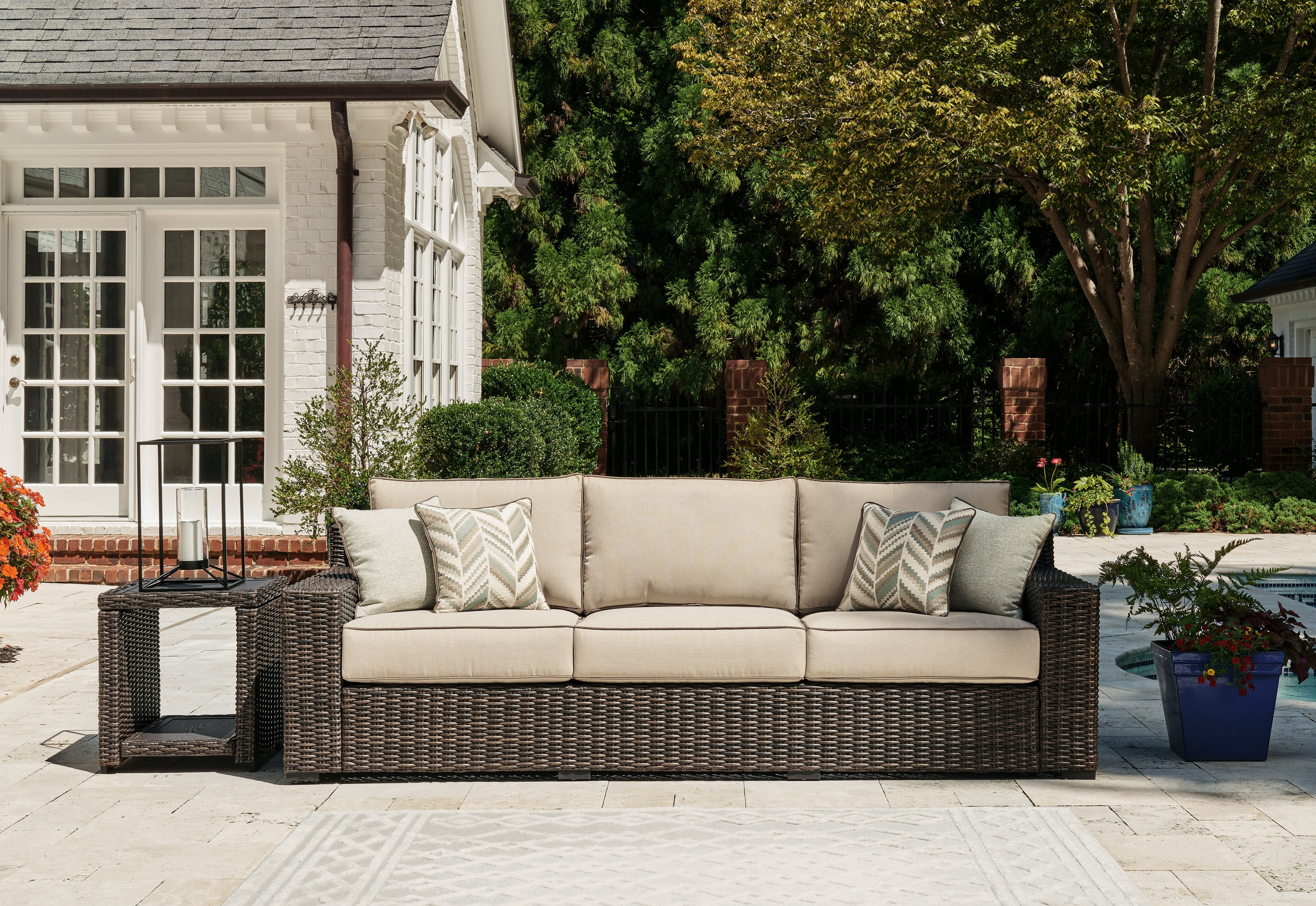Floridian Furniture - Ashley Furniture - Coastline Bay Outdoor - Sofa with Cushion / Brown - P784-838