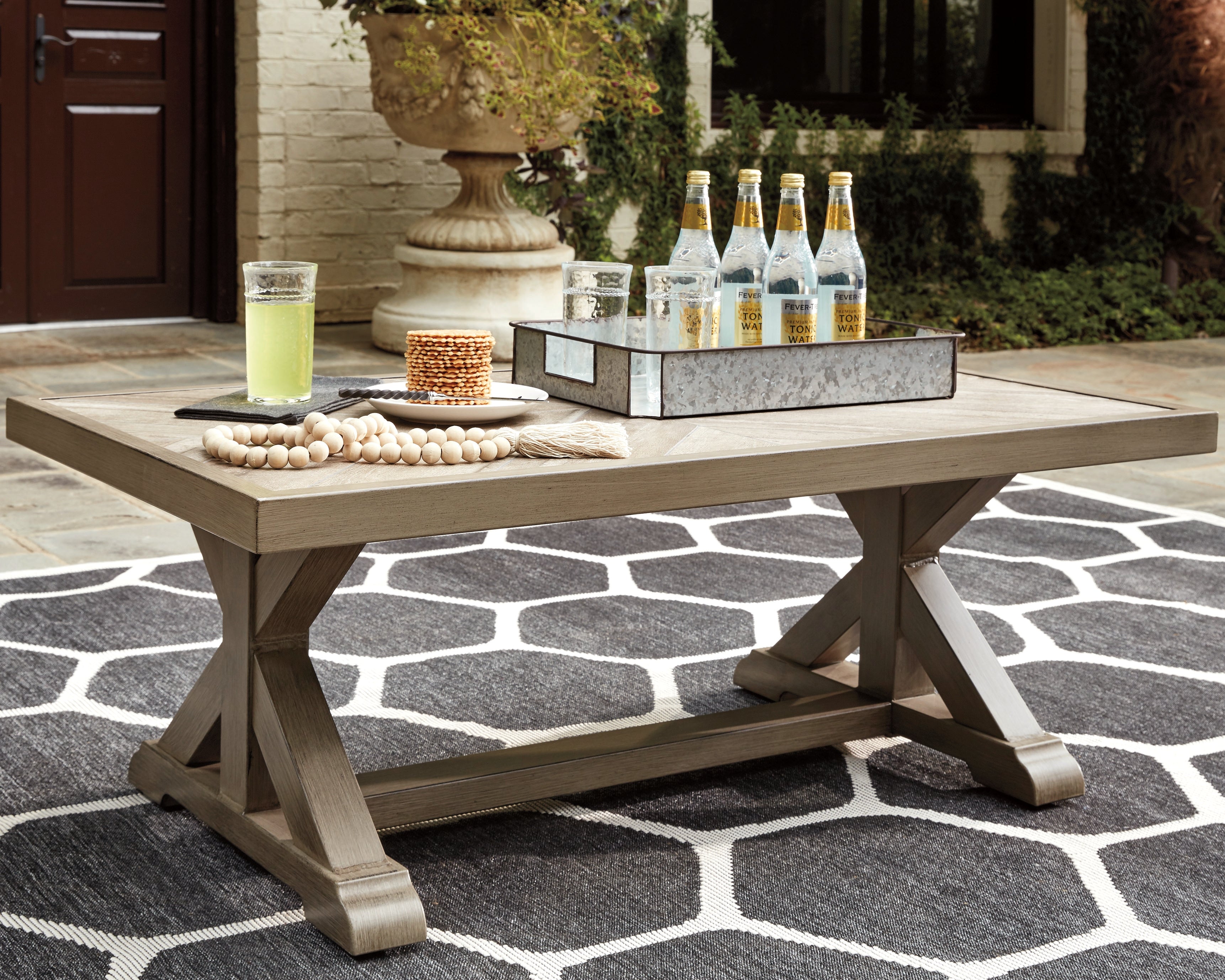 Floridian Furniture - Ashley Furniture - Beachcroft Outdoor - Rectangular Cocktail Table / Beige - P791-701