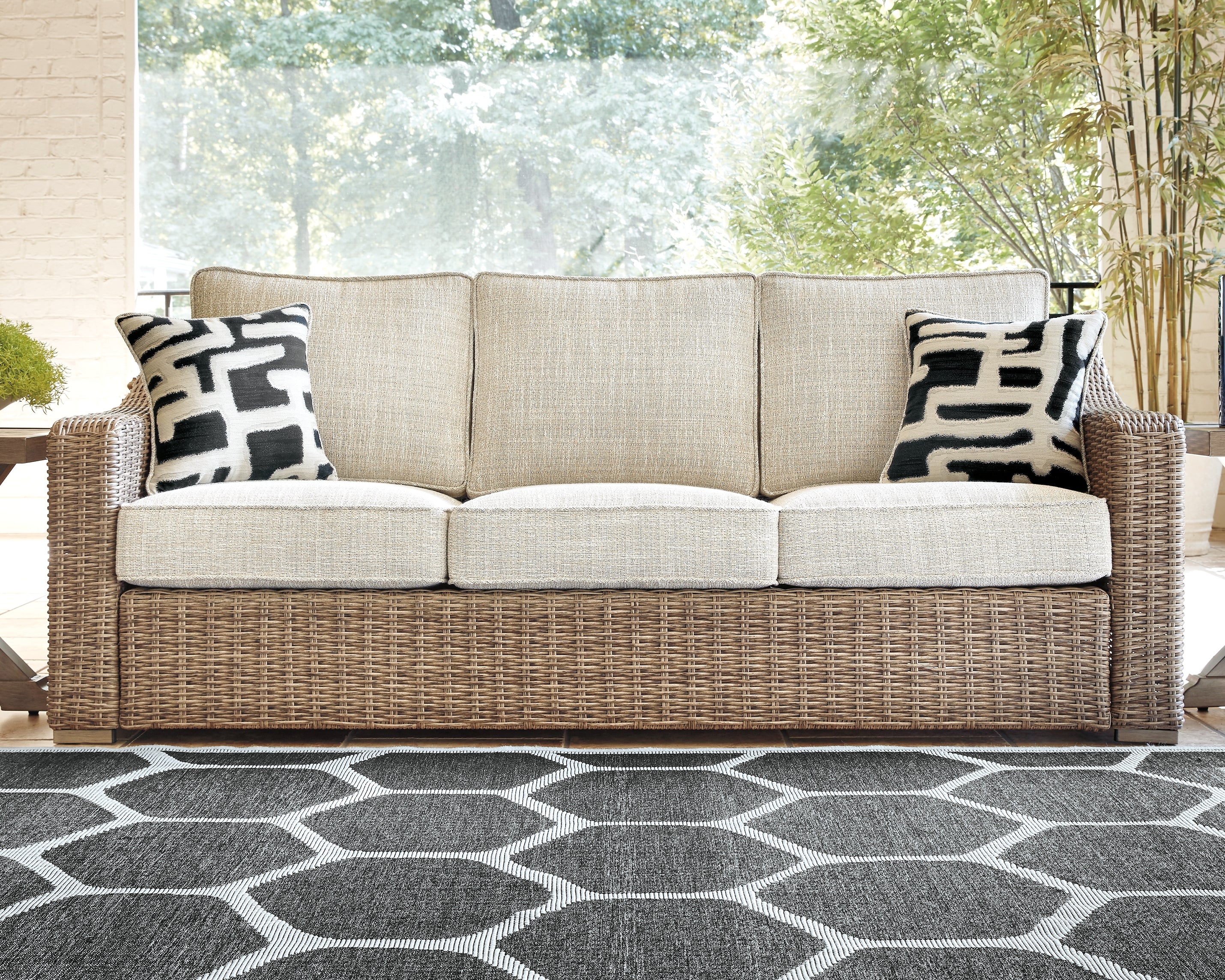 Floridian Furniture - Ashley Furniture - Beachcroft Outdoor - Sofa with Cushion / Beige - P791-838