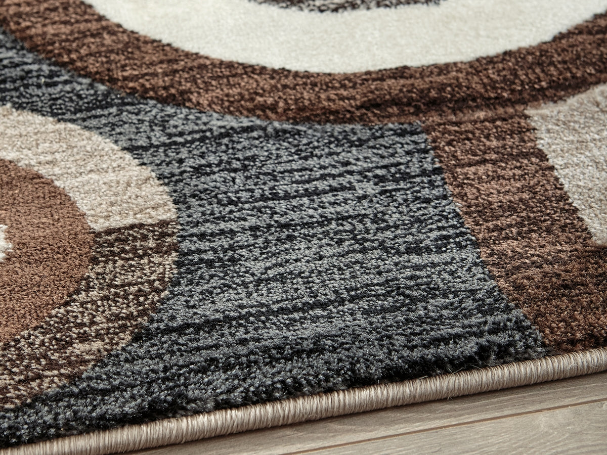 Floridian Furniture - Ashley Furniture - Guintte Rug - 5' x 6'7" Rug / Multi - R403972
