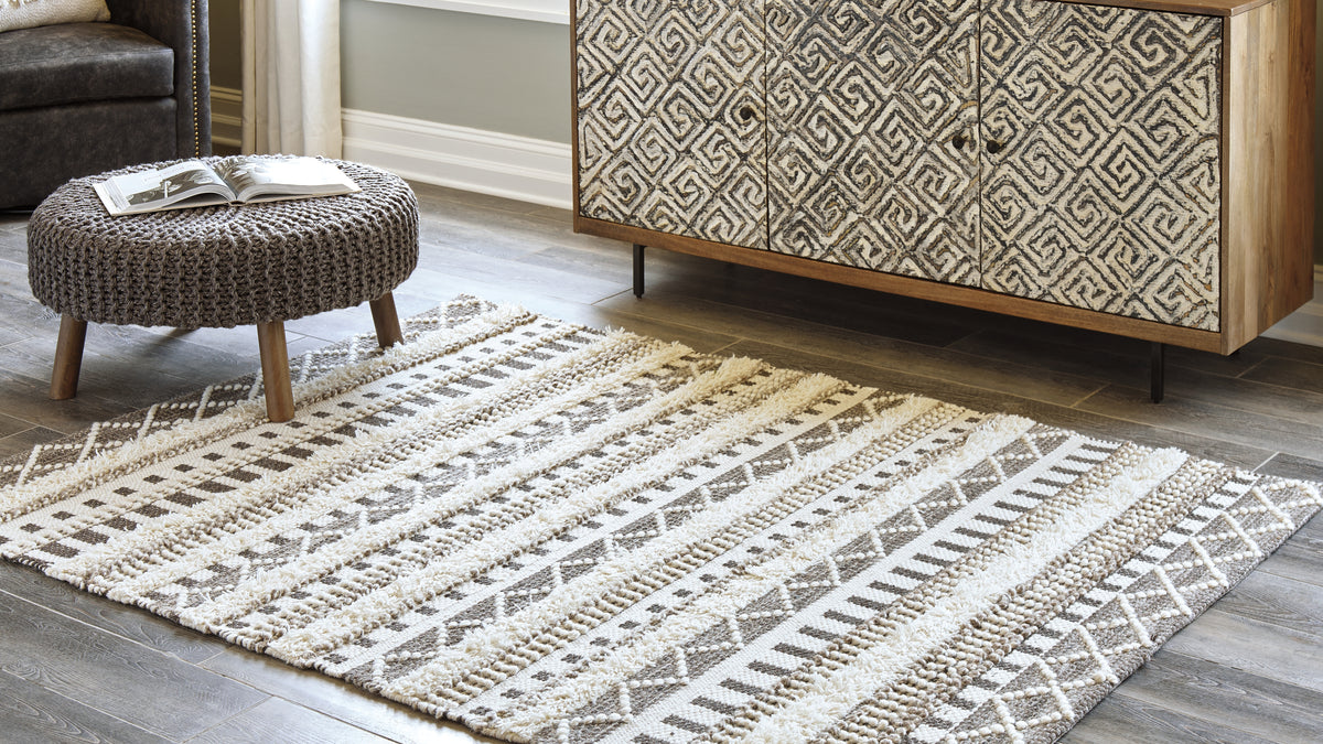 Floridian Furniture - Ashley Furniture - Karalee Rug - 5' x 7' Rug / Ivory/Brown - R404442