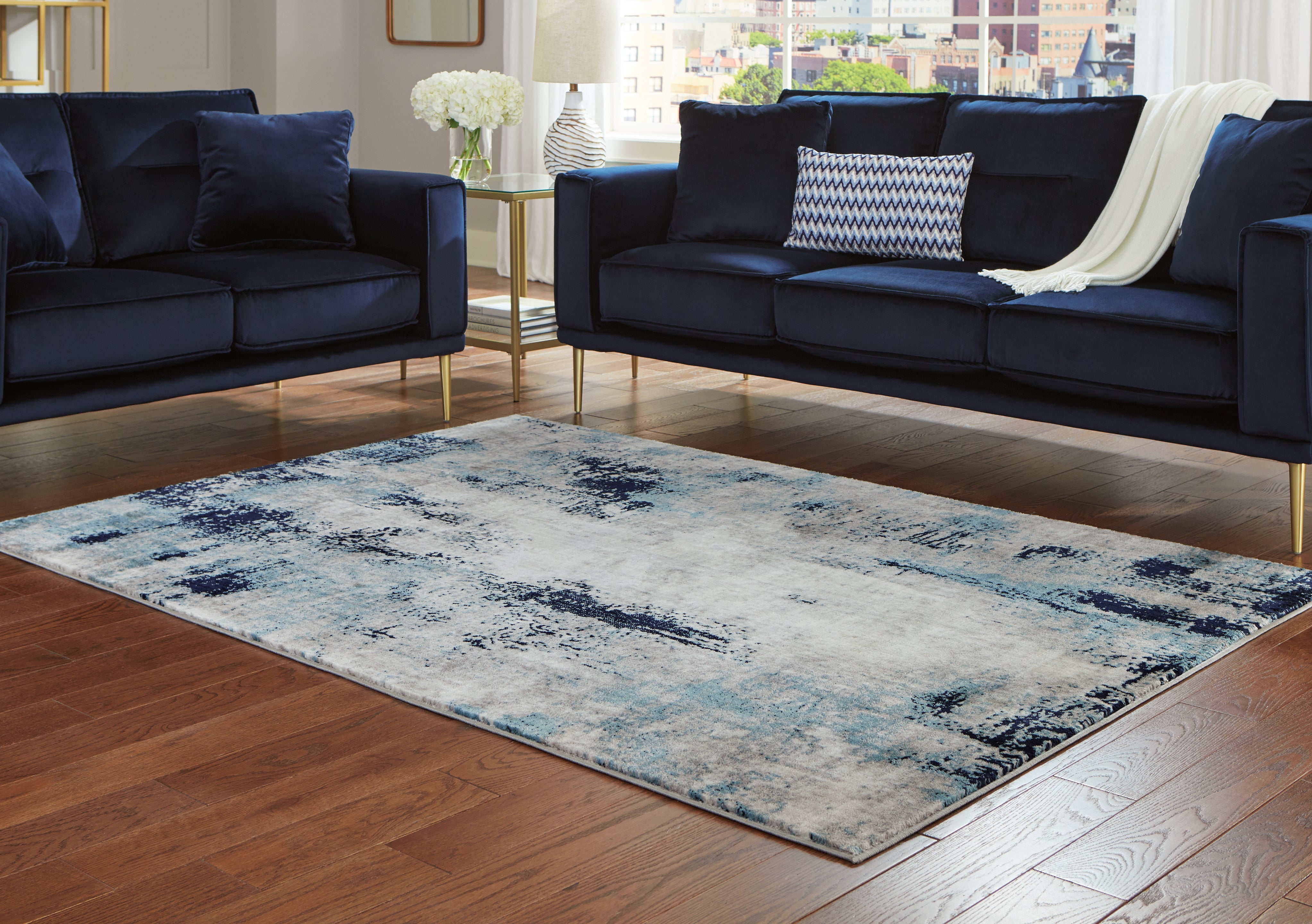 Floridian Furniture - Ashley Furniture - Leonelle Rug - 5'3" x 7'3" Rug / Cream/Blue/Gray - R404872