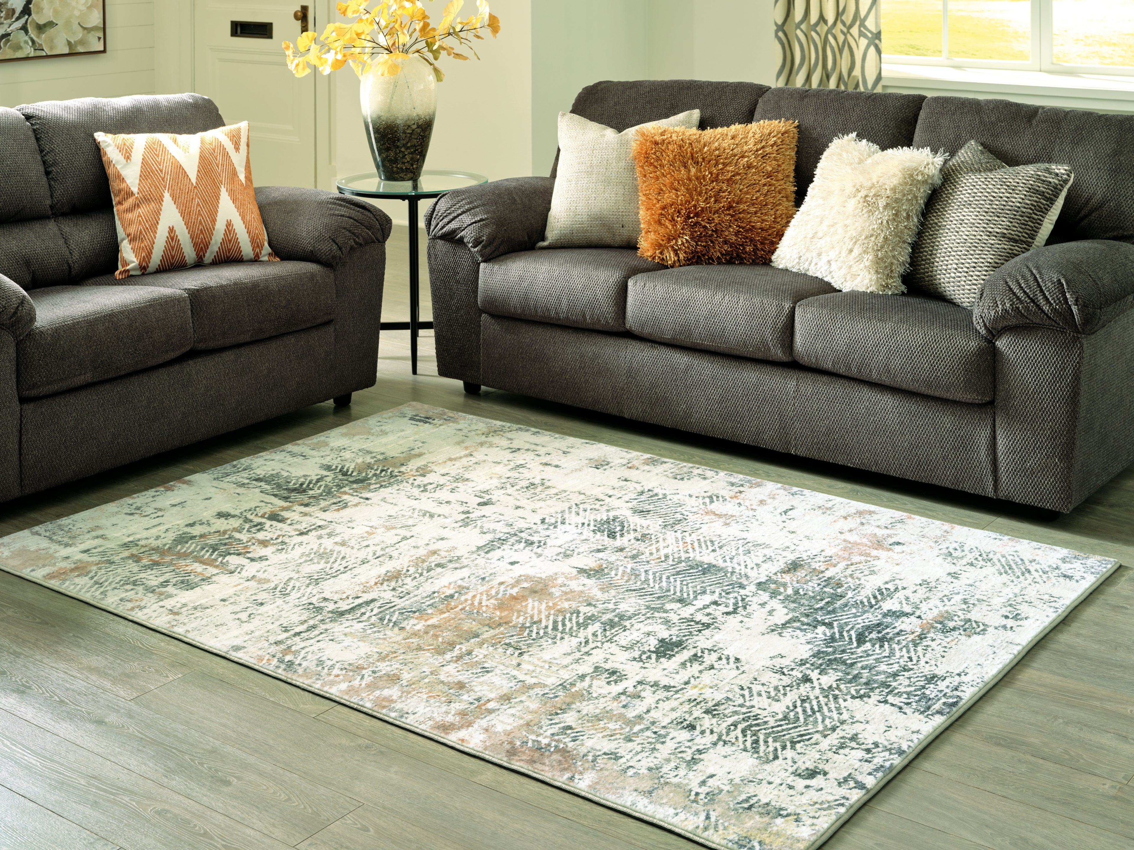 Floridian Furniture - Ashley Furniture - Redlings Rug - 7'5" x 9'6" Rug / Multi - R405451
