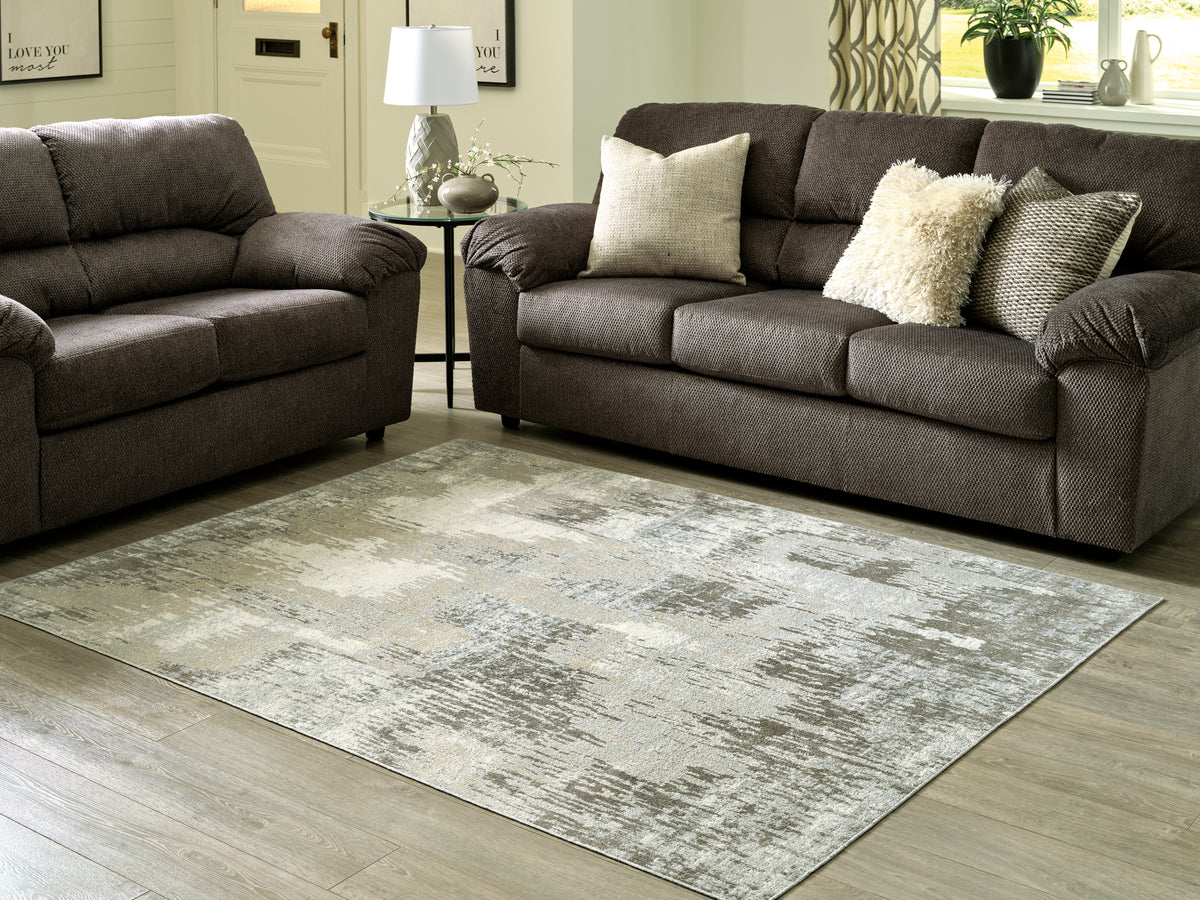 Floridian Furniture - Ashley Furniture - Arriston Rug - 5'3" x 7' Washable Rug / Multi - R405562