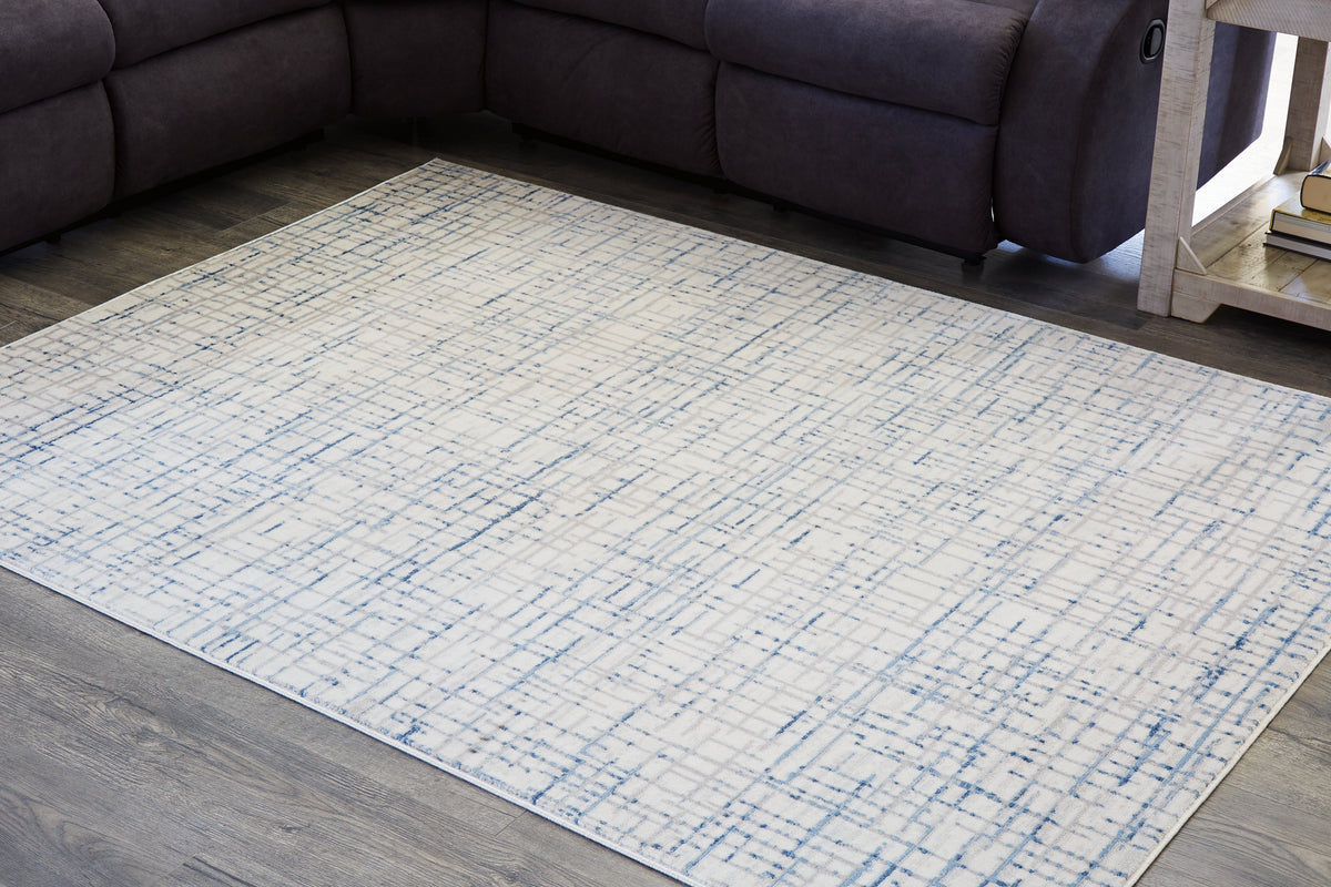 Floridian Furniture - Ashley Furniture - Beckfille Rug - 5' x 7' Rug / Blue/Gray/Cream - R405962