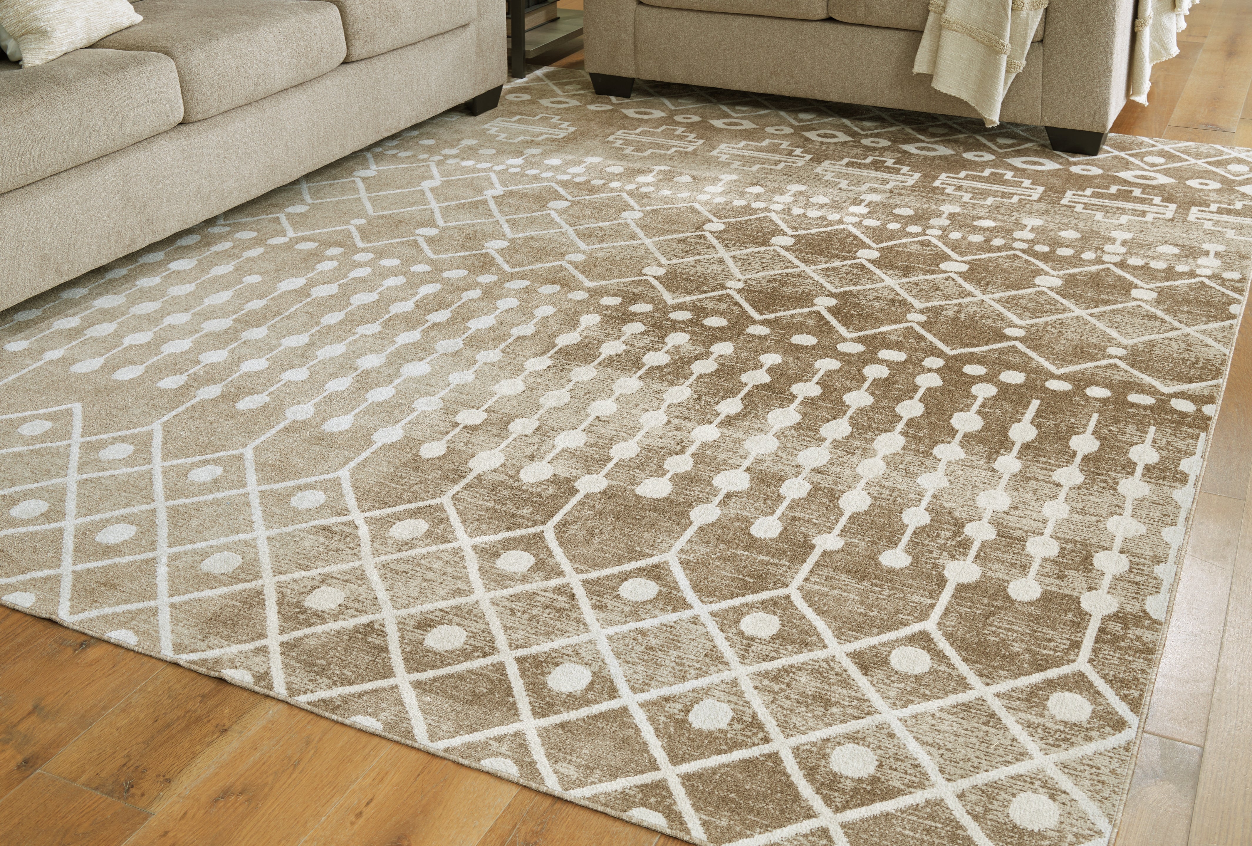 Floridian Furniture - Ashley Furniture - Bunchly Rug - 7'10" x 10'3" Washable Rug / Tan/Brown/Cream - R406221