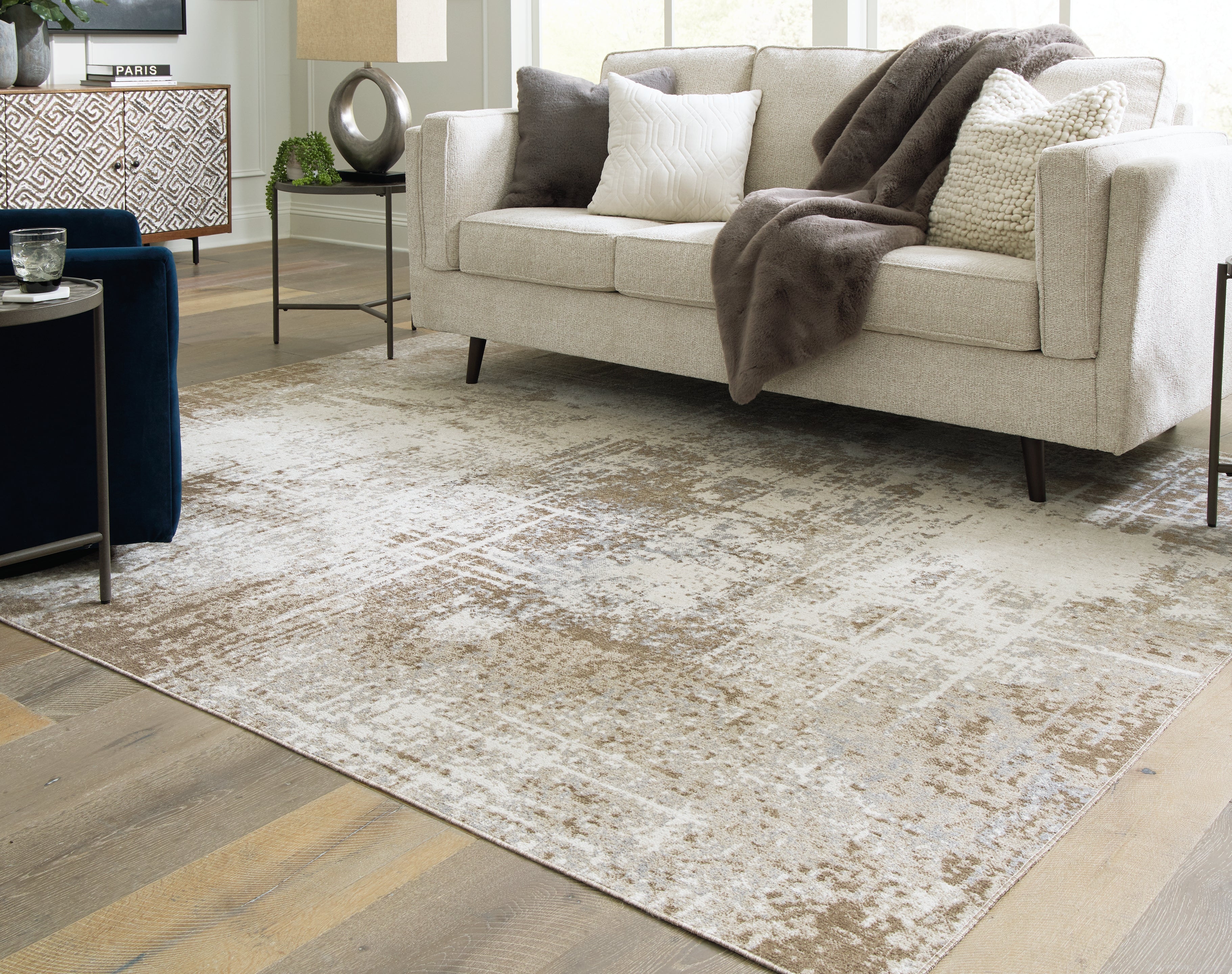 Floridian Furniture - Ashley Furniture - Grifflain Rug - 7'10" x 10'3" Washable Rug / Tan/Brown/Gray - R406231