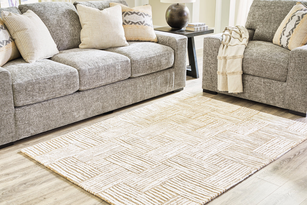 Floridian Furniture - Ashley Furniture - Adanmund Rug - 5' x 7' Rug / Beige/Caramel - R406412
