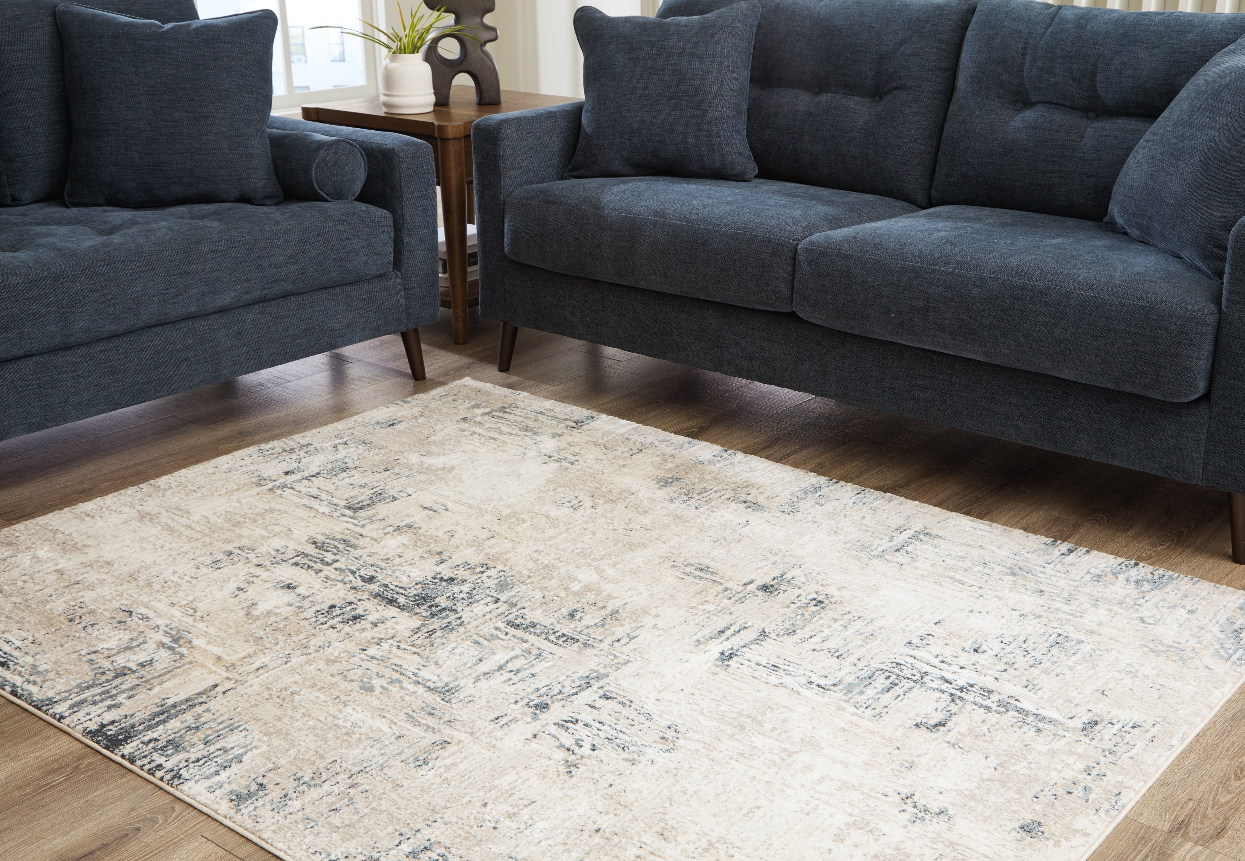 Floridian Furniture - Ashley Furniture - Gentor Rug - 5' x 7' Rug / Blue/Ivory - R406522