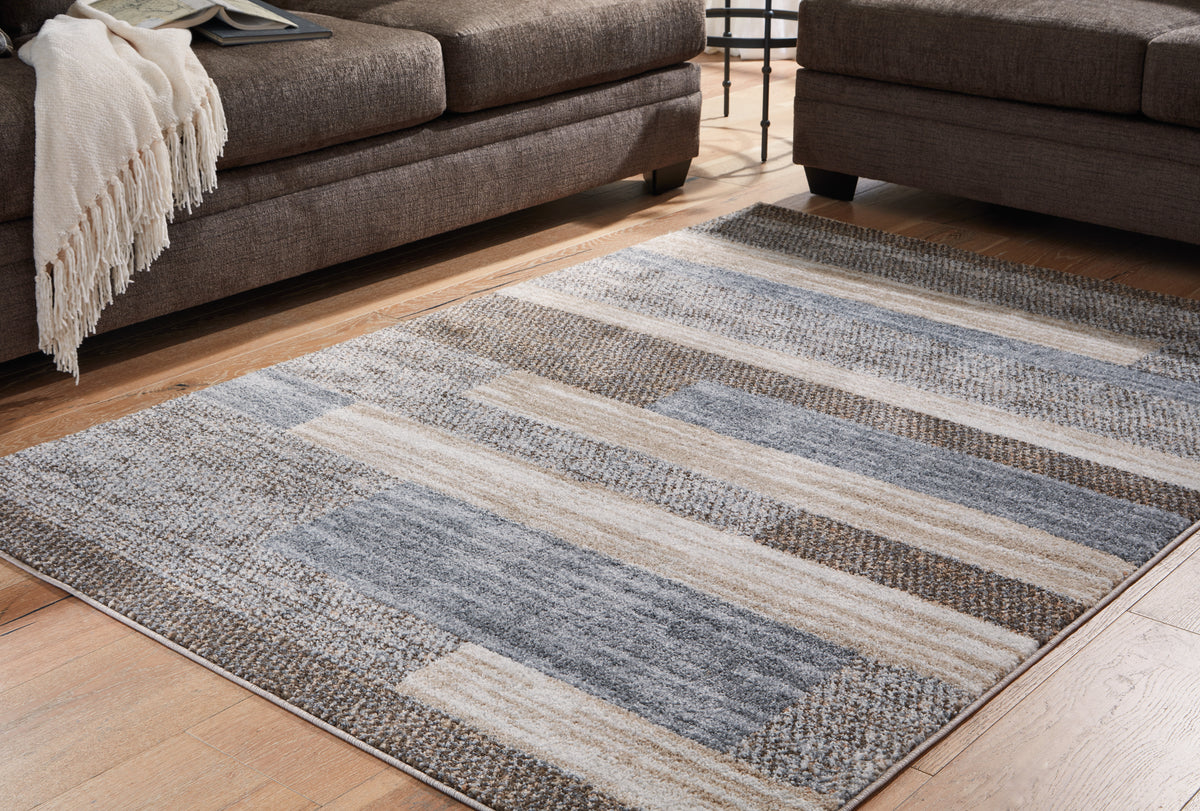 Floridian Furniture - Ashley Furniture - Sethburn Rug - 8' x 10' Rug / Cream/Brown/Gray - R406591