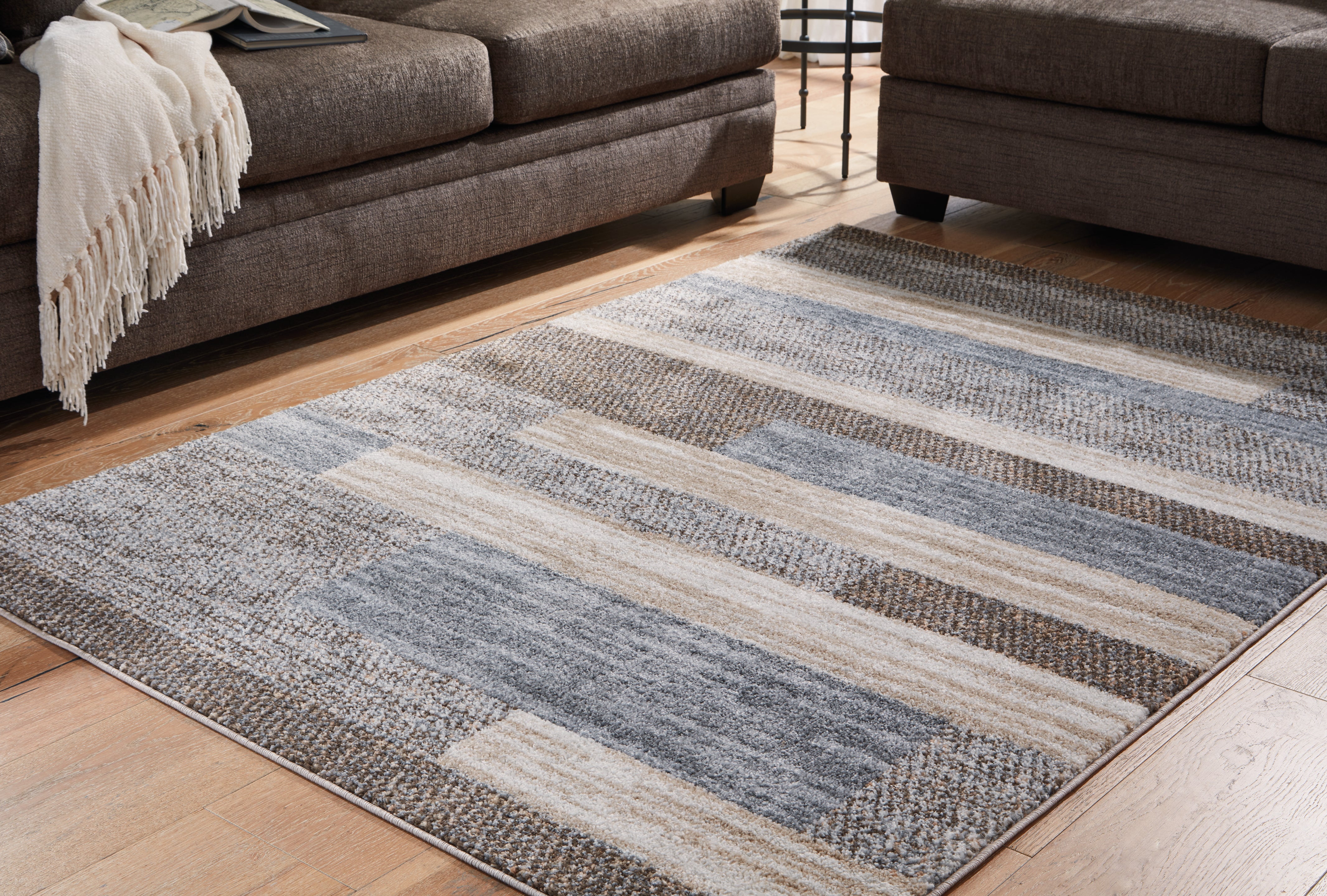 Floridian Furniture - Ashley Furniture - Sethburn Rug - 5' x 7' Rug / Cream/Brown/Gray - R406592