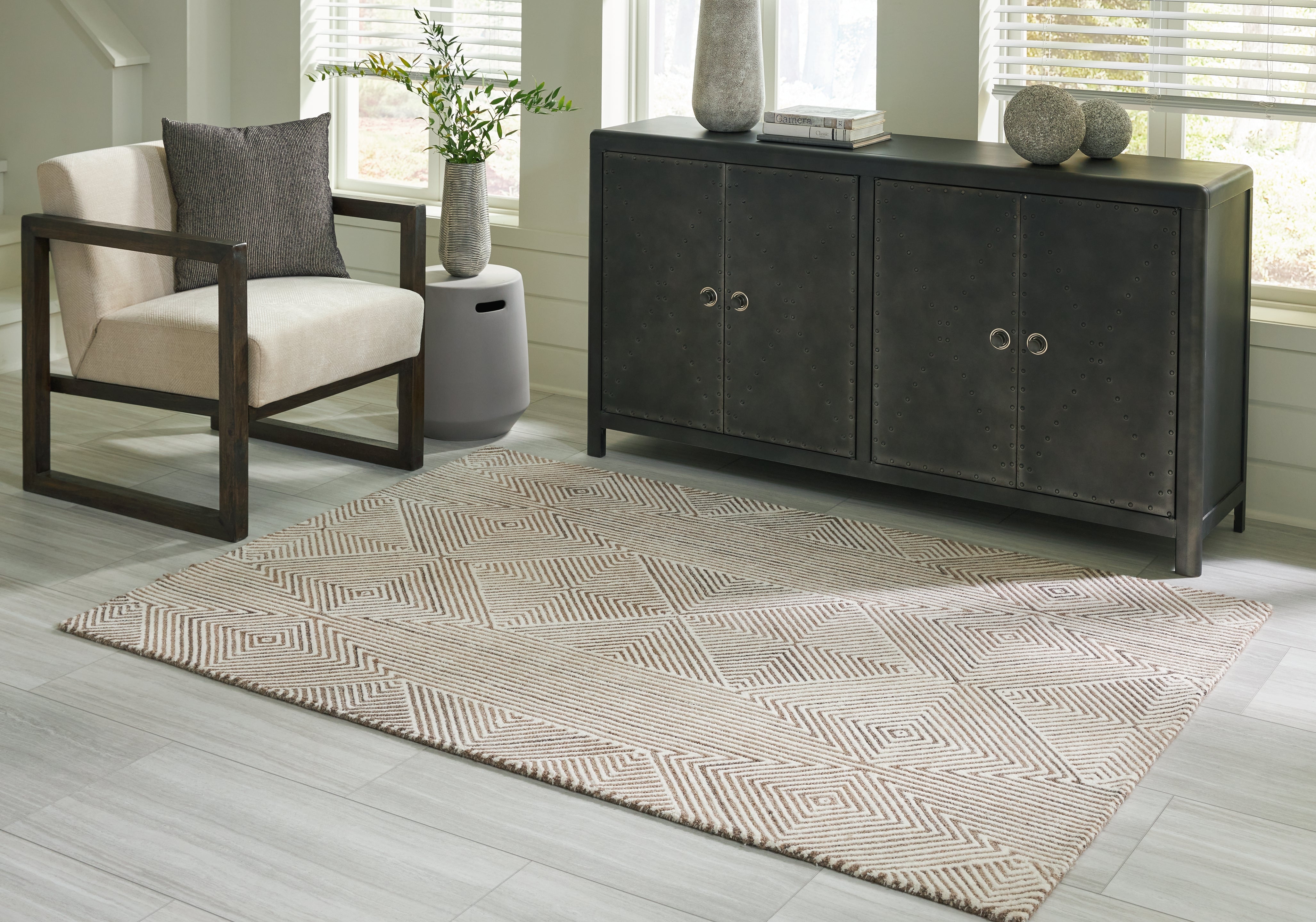 Floridian Furniture - Ashley Furniture - Jadott Rug - 5' x 7' Rug / Beige/Brown - R406802