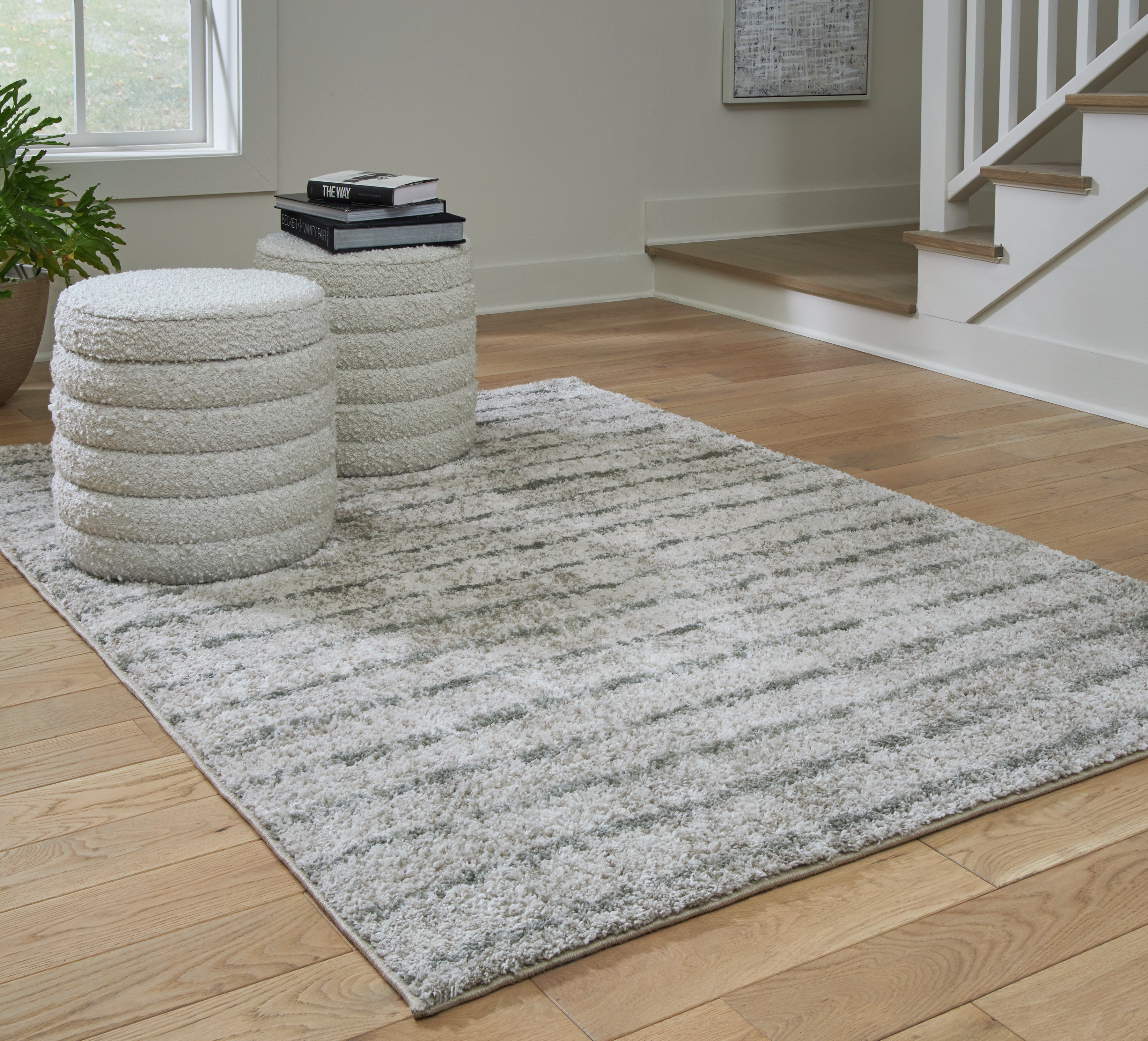 Floridian Furniture - Ashley Furniture - Laddway Rug - 5' x 7' Rug / Cream/Green - R406882