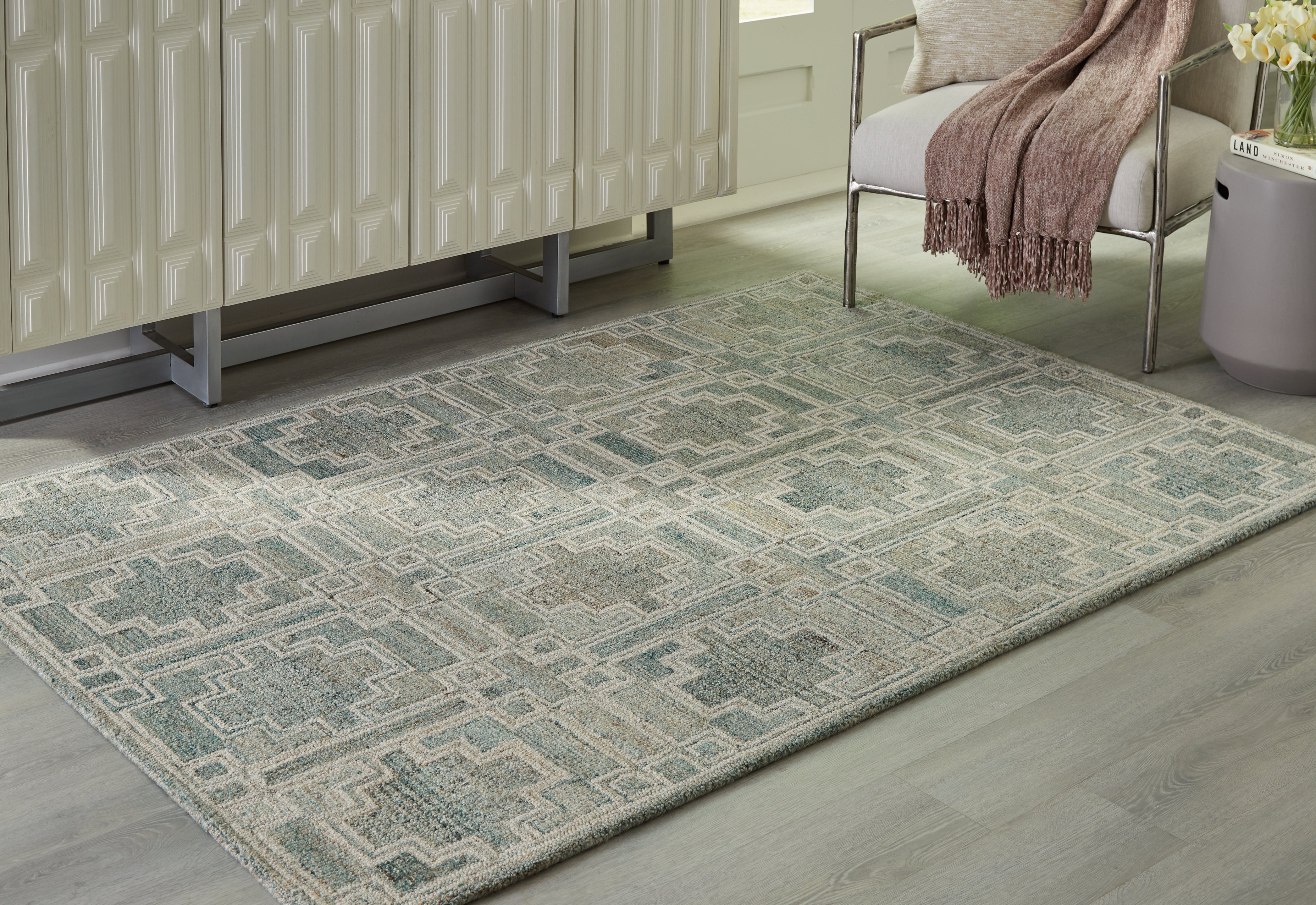 Floridian Furniture - Ashley Furniture - Jossland Rug - 5' x 7' Rug / Green/Ivory - R406912