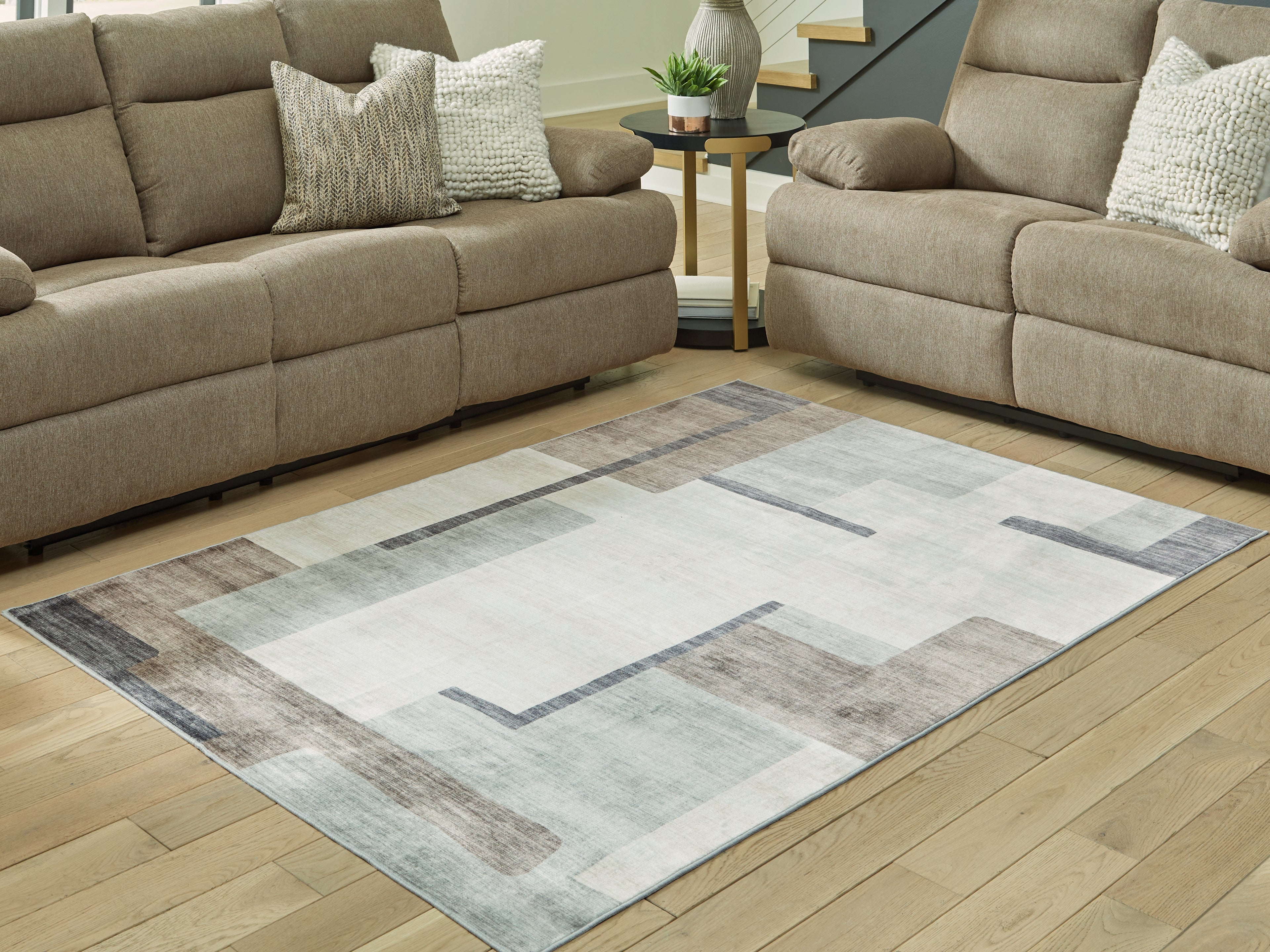 Floridian Furniture - Ashley Furniture - Larkport Rug - Washable 5' x 7' Area Rug / Cream/Brown/Gray - R407412