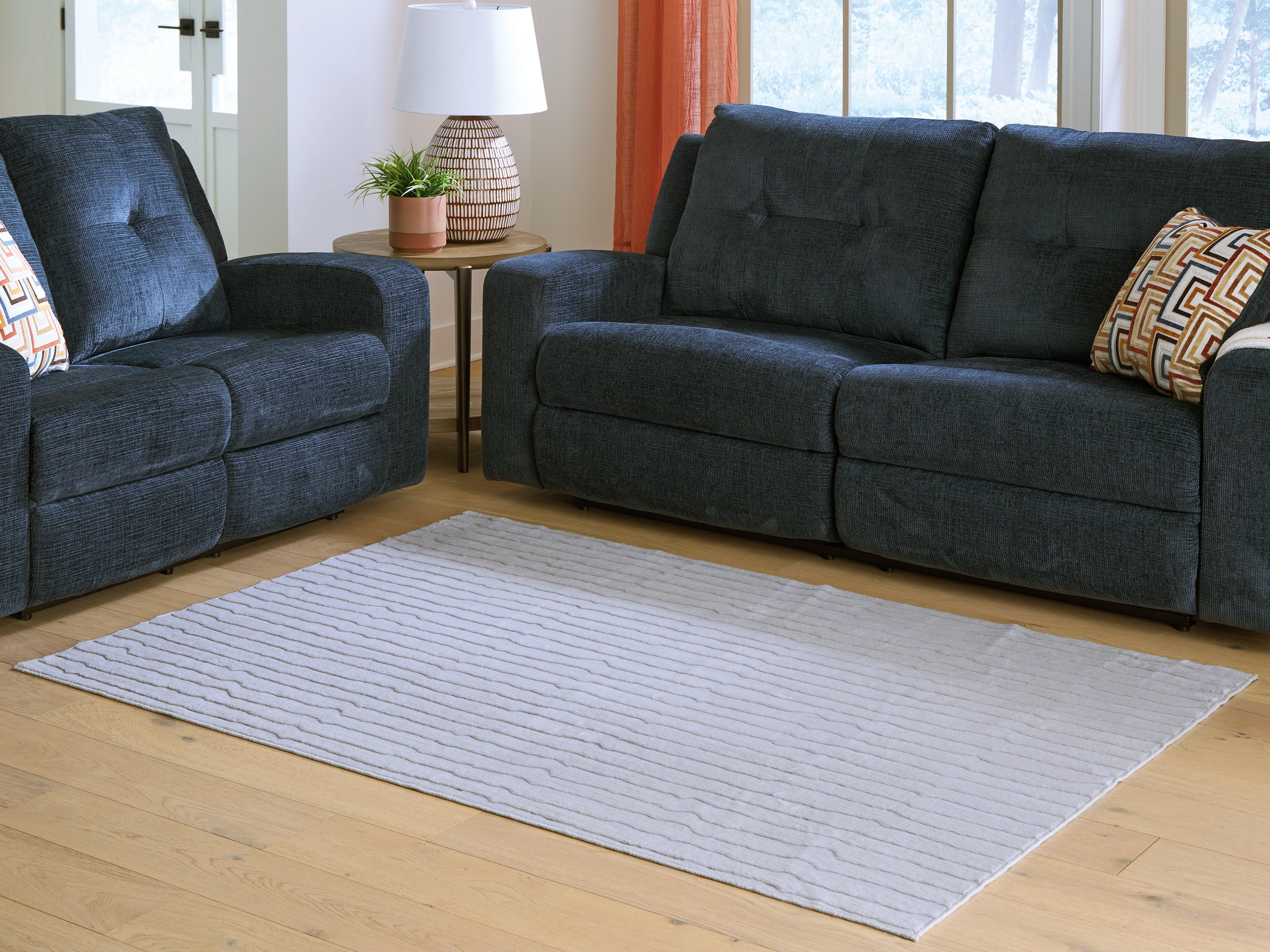 Floridian Furniture - Ashley Furniture - Worthley Rug - Washable 5' x 7' Area Rug / Gray - R407452