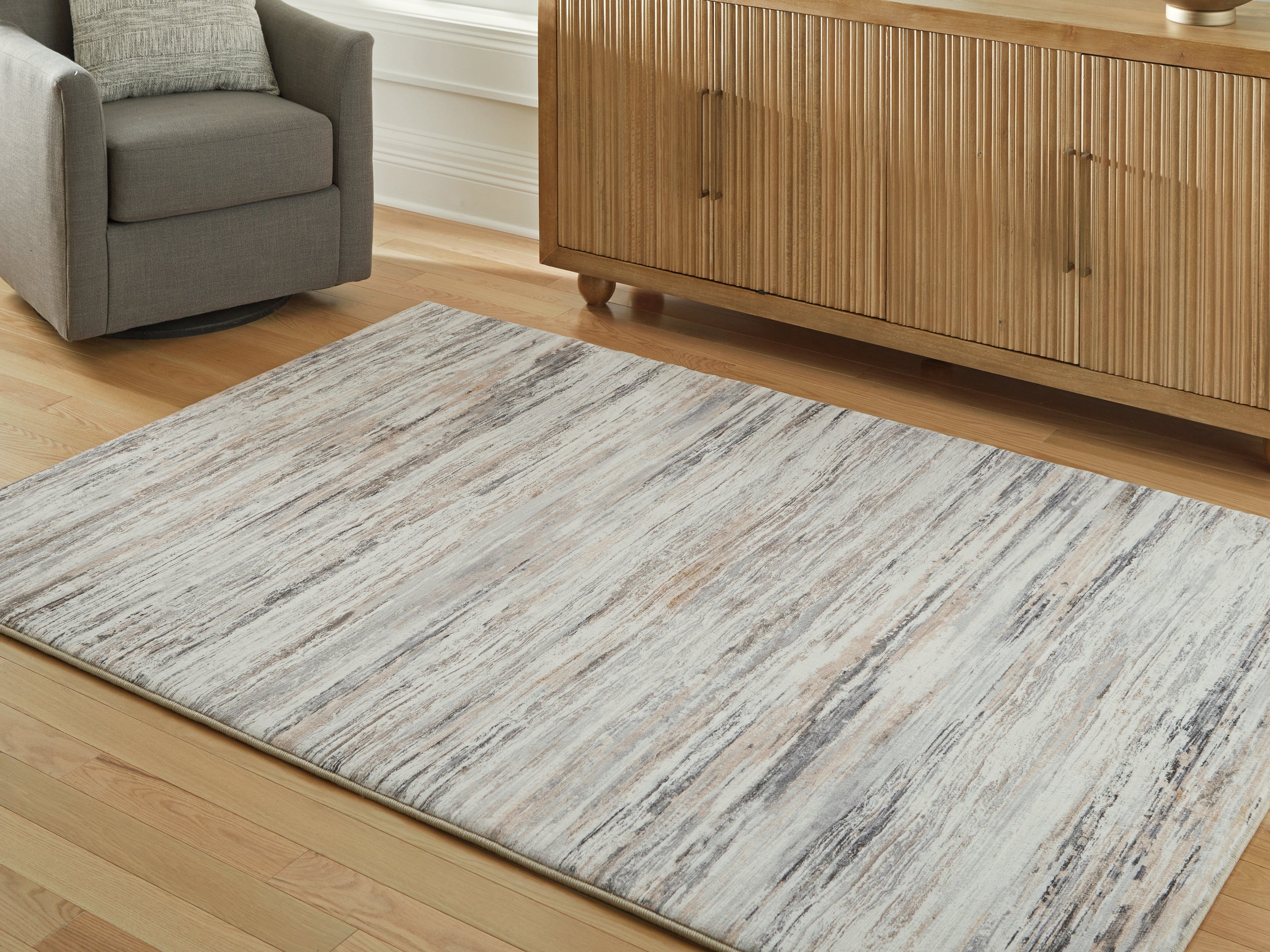 Floridian Furniture - Ashley Furniture - Nace Rug - 5' x 7' Area Rug / Gray/Brown/White - R407472