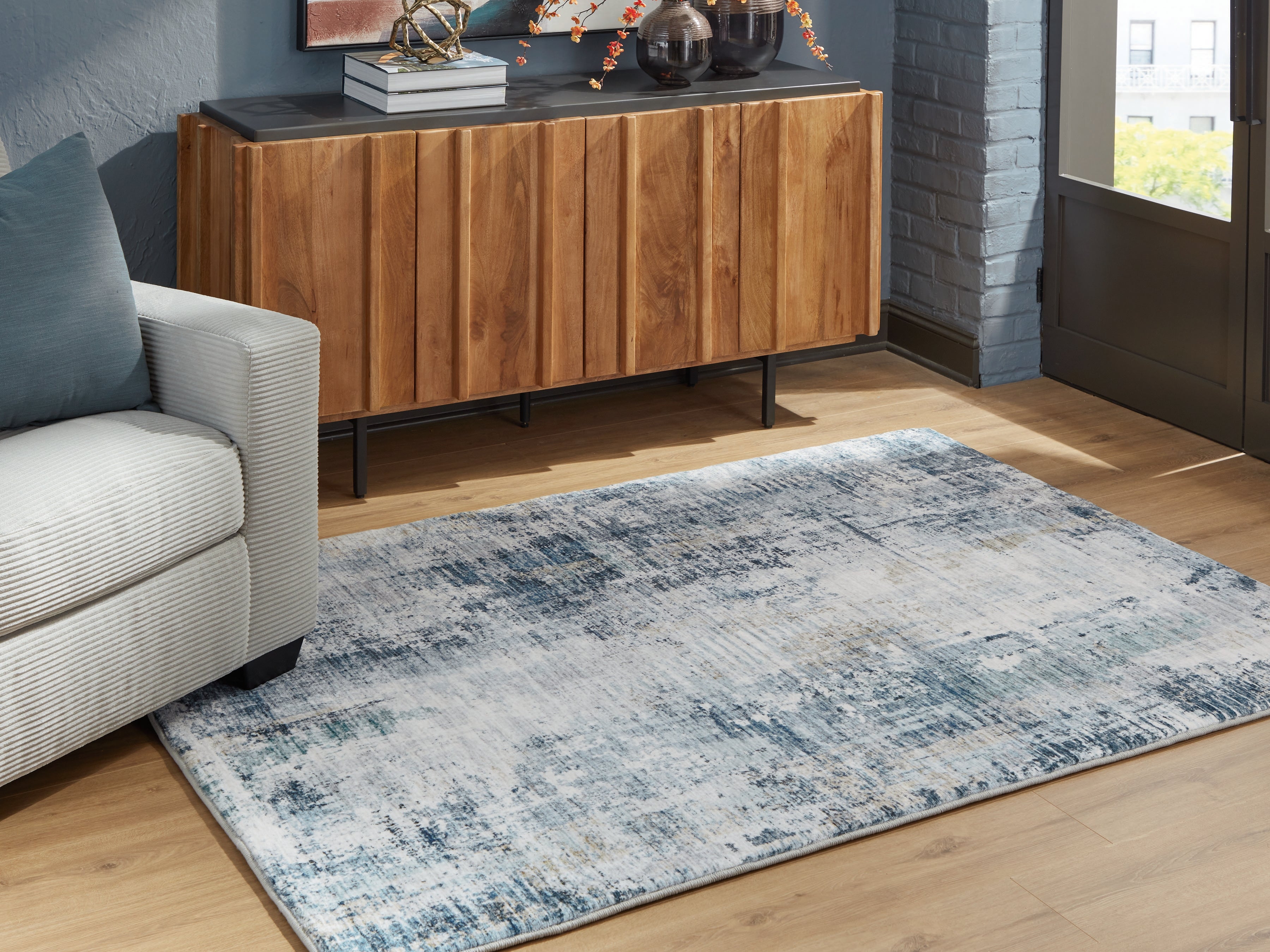 Floridian Furniture - Ashley Furniture - Arlenmont Rug - 5' x 7' Area Rug / Blue/White/Brown - R407482