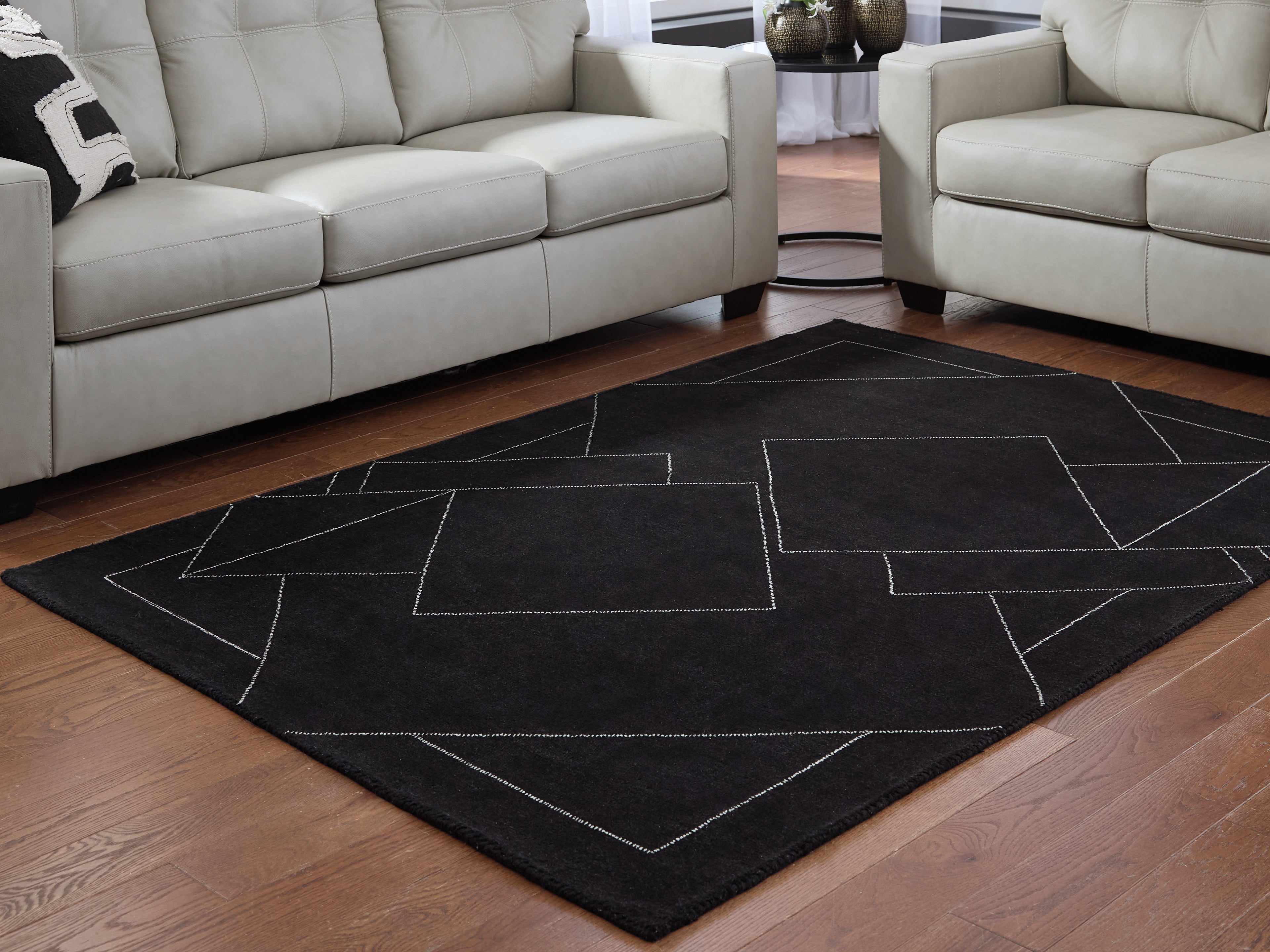 Floridian Furniture - Ashley Furniture - Marav Rug - 5' x 7' Area Rug / Black/White - R407532