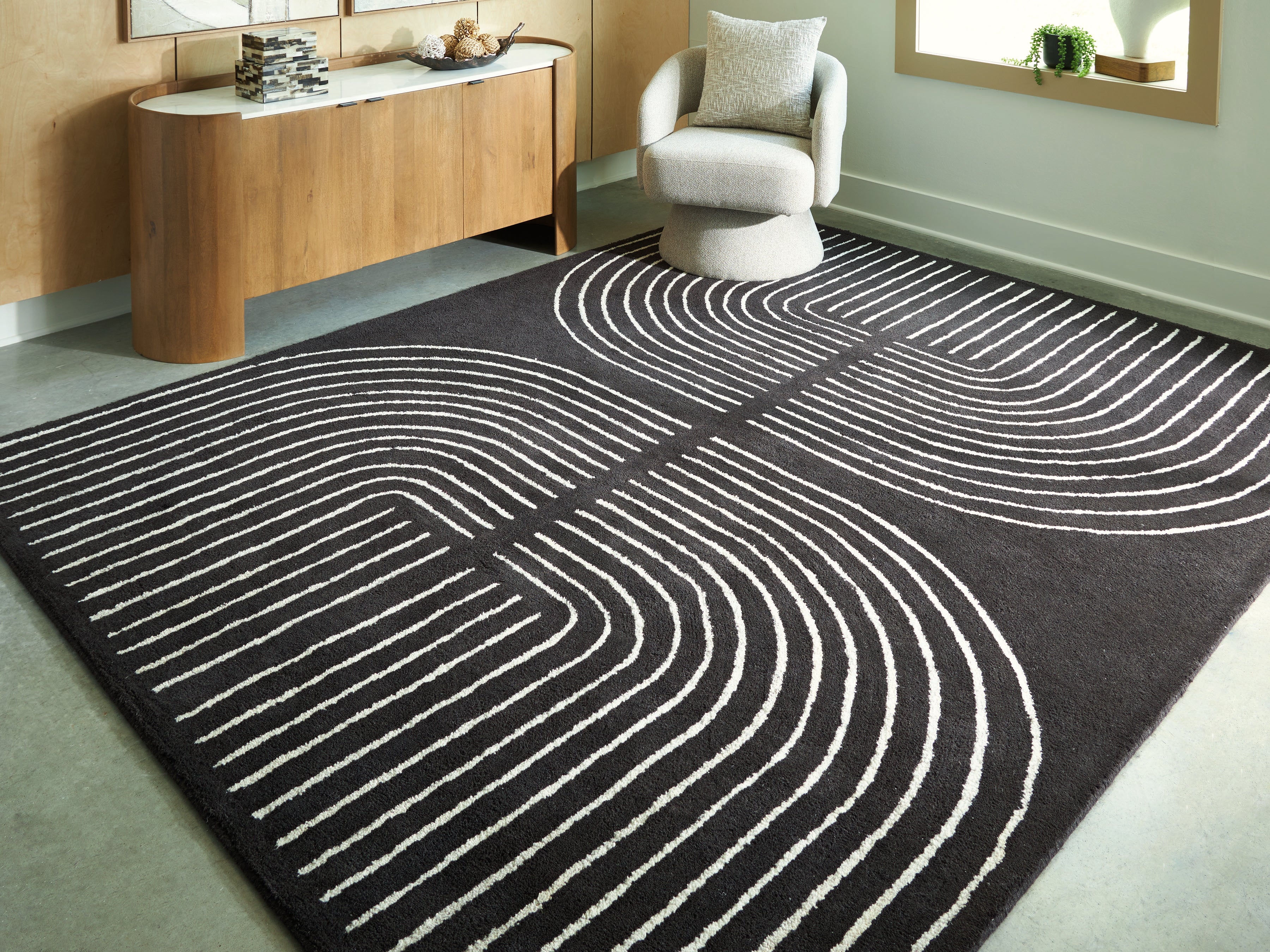 Floridian Furniture - Ashley Furniture - Eldonmore Rug - 7'8" x 10' Area Rug / Black/Ivory - R407571