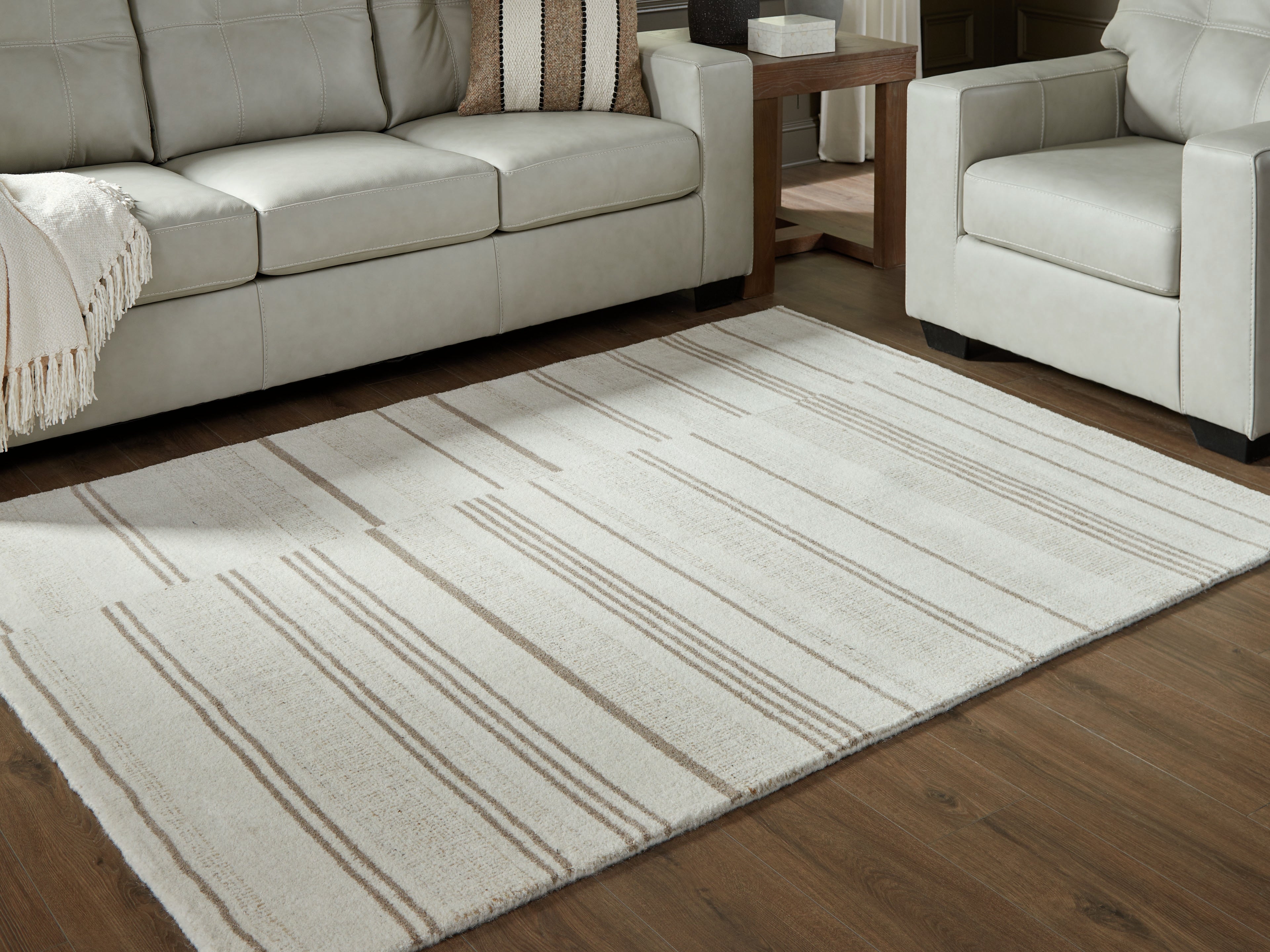 Floridian Furniture - Ashley Furniture - Gadence Rug - 5' x 7' Area Rug / Ivory/Tan - R407642
