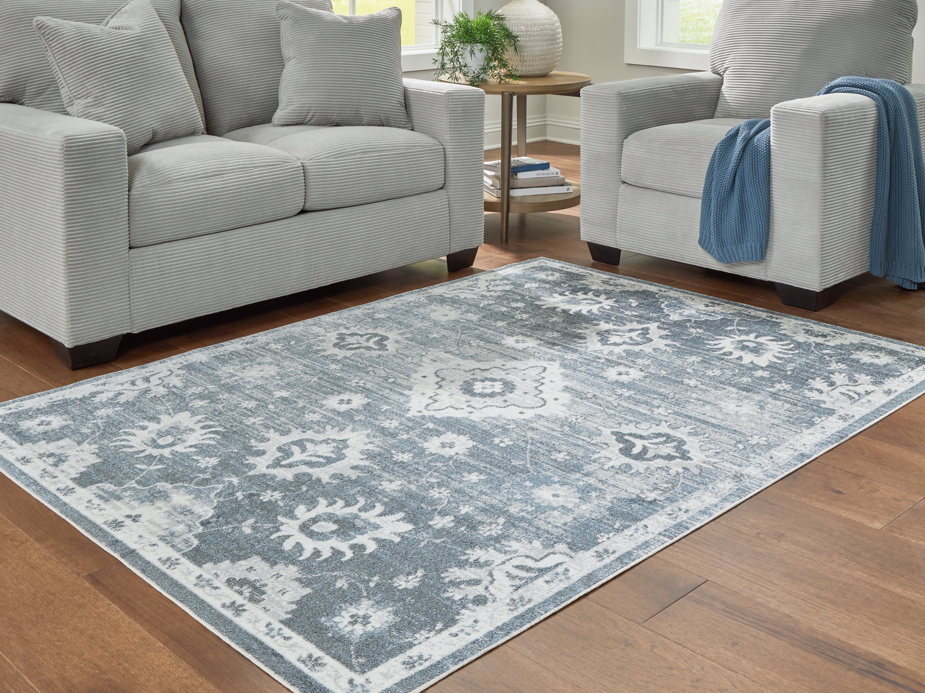 Floridian Furniture - Ashley Furniture - Avanworths Rug - Washable 7'10" x 10' Area Rug / Blue/Gray/Ivory - R407791