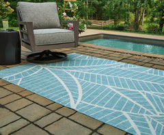 Floridian Furniture - Ashley Furniture - Hulsia Rug - 5' x 7' Rug / Ivory/Aqua - R900122