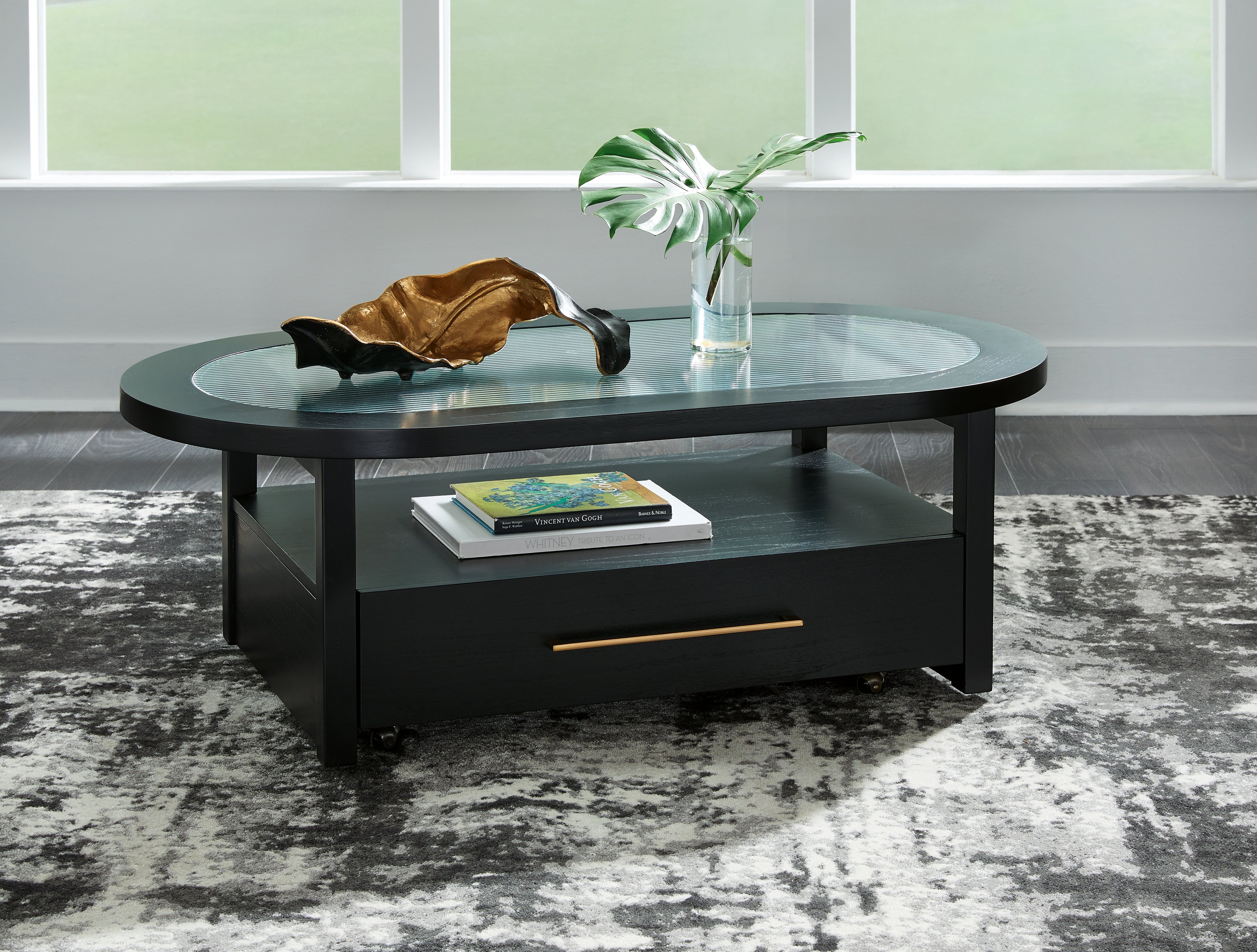 Floridian Furniture - Ashley Furniture - Winbardi Coffee Table - Oval Cocktail Table / Black - T786-0