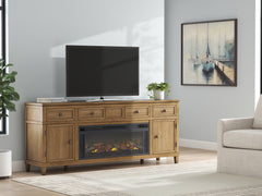 Floridian Furniture - Ashley Furniture - Sharlance 81" TV Stand with Electric Fireplace - 81" TV Stand with Electric Fireplace / Light Brown - W655W1