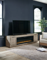 Floridian Furniture - Ashley Furniture - Krystanza TV Stand with Electric Fireplace - TV Stand with Electric Fireplace / Weathered Gray - W760W1
