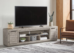 Floridian Furniture - Ashley Furniture - Naydell 92" TV Stand - 92" / Gray - W996-78